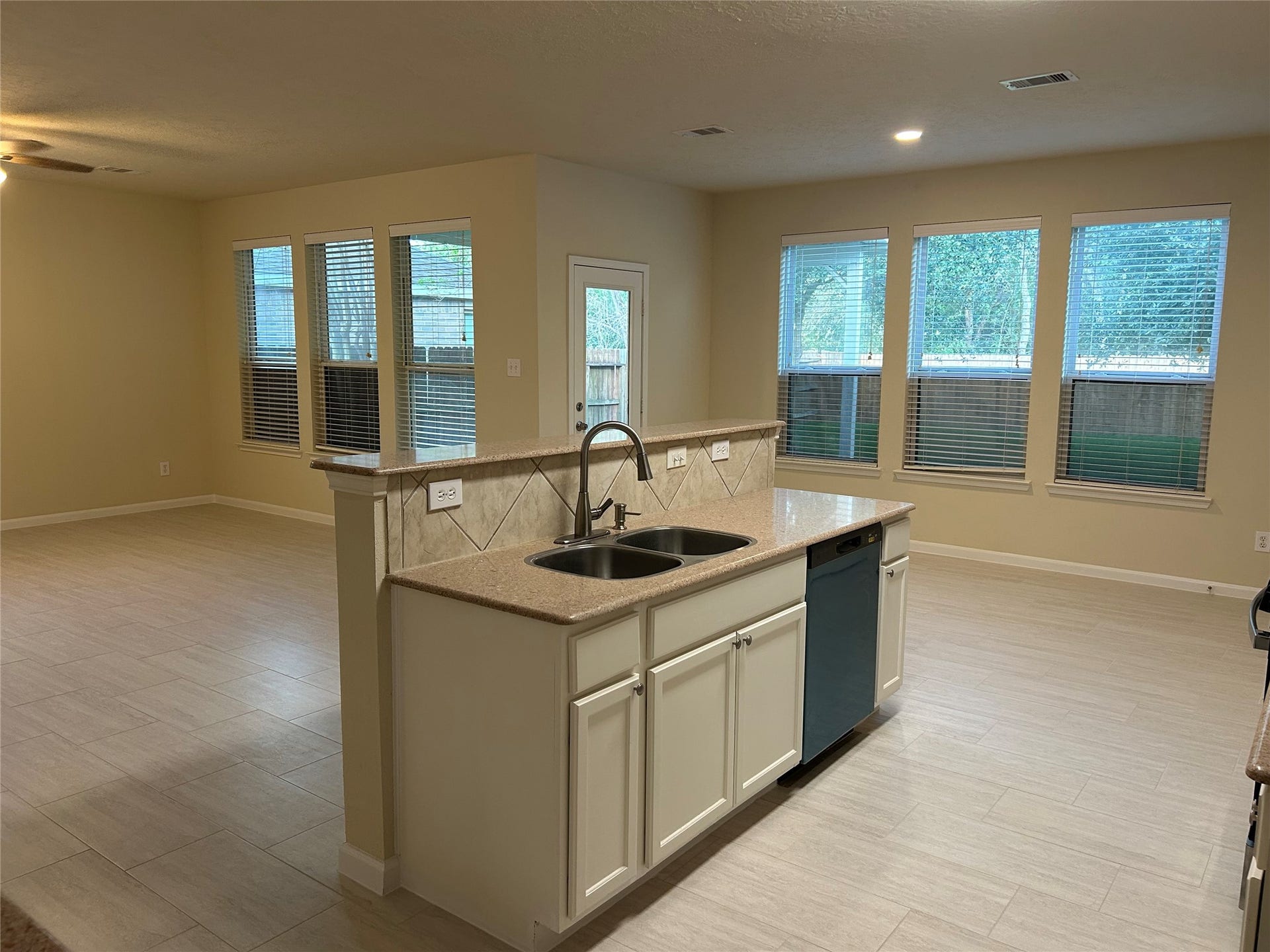 106 Easton Glen Lane, Dickinson, TX 77539 A view of the kitchen with easy access to the dining area as well as the family room.