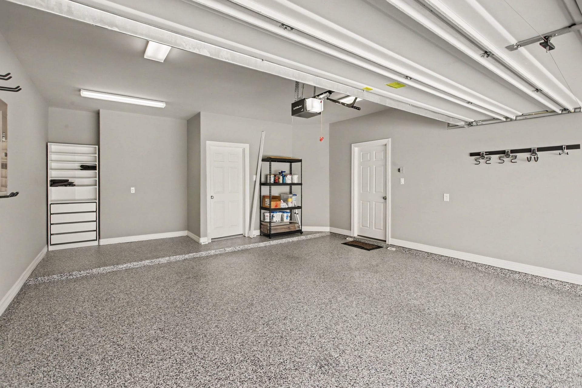 1506 Peyton Oaks Place, Houston, TX 77043 Garage with durable, decorative epoxy flake flooring