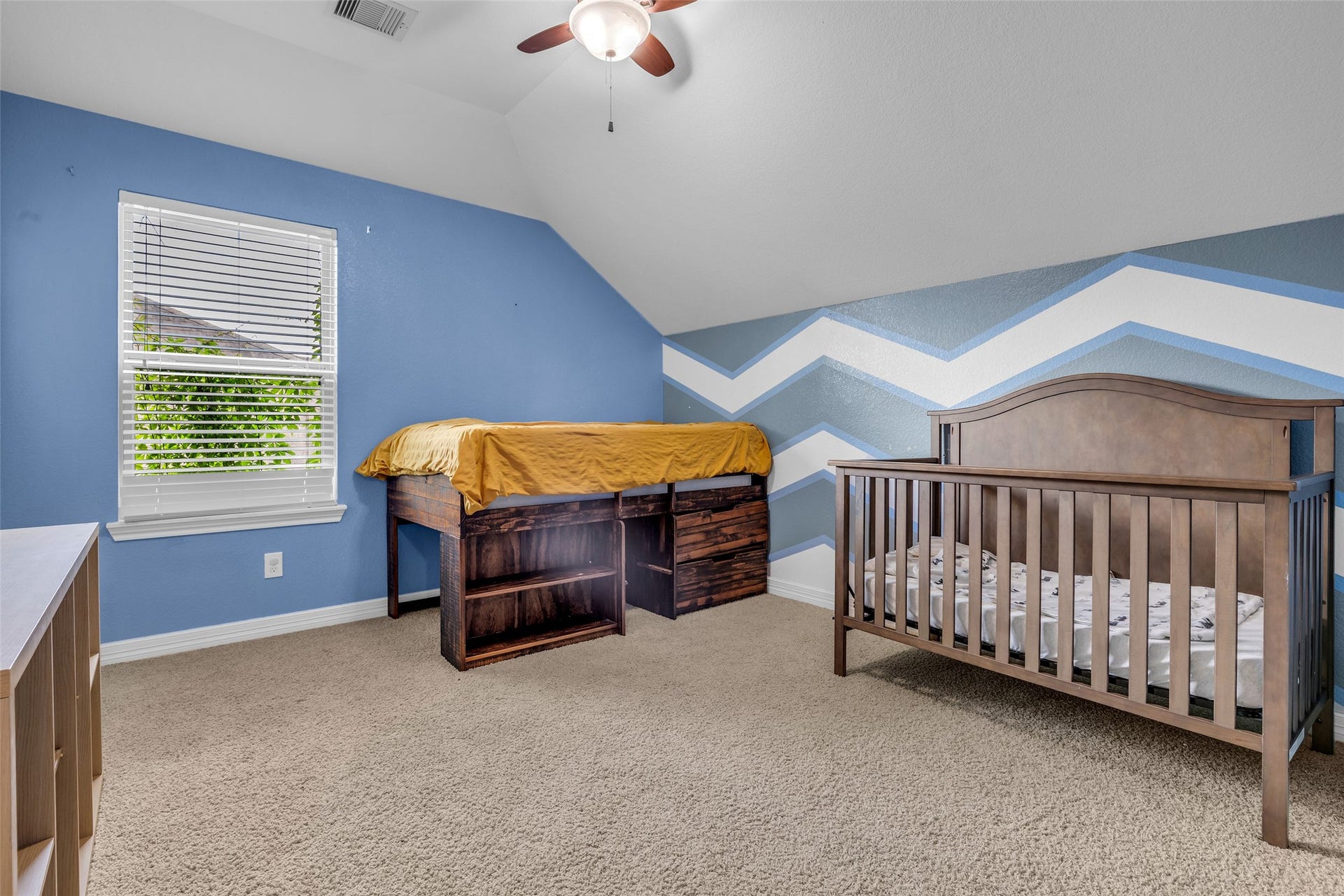 7 Ember Branch Drive, Missouri City, TX 77459 A roomy secondary bedroom with a vaulted ceiling and plenty of space to make it your own.