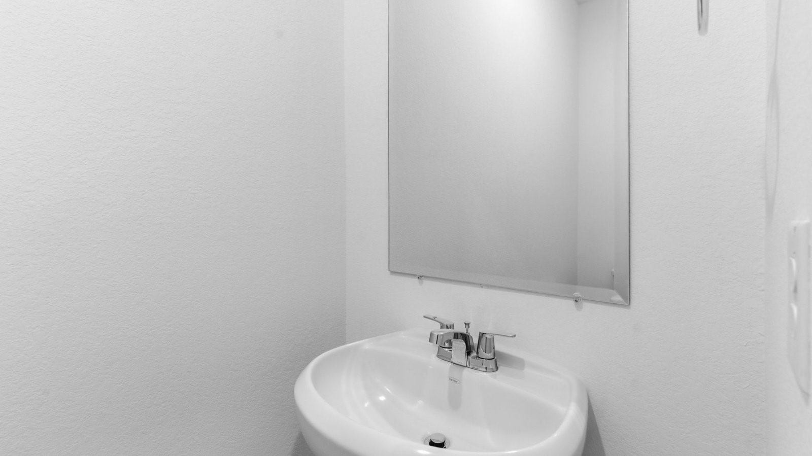 3406 Horseshoe Trail Lane, League City, TX 77511 A decorated half bathroom downstairs for guests