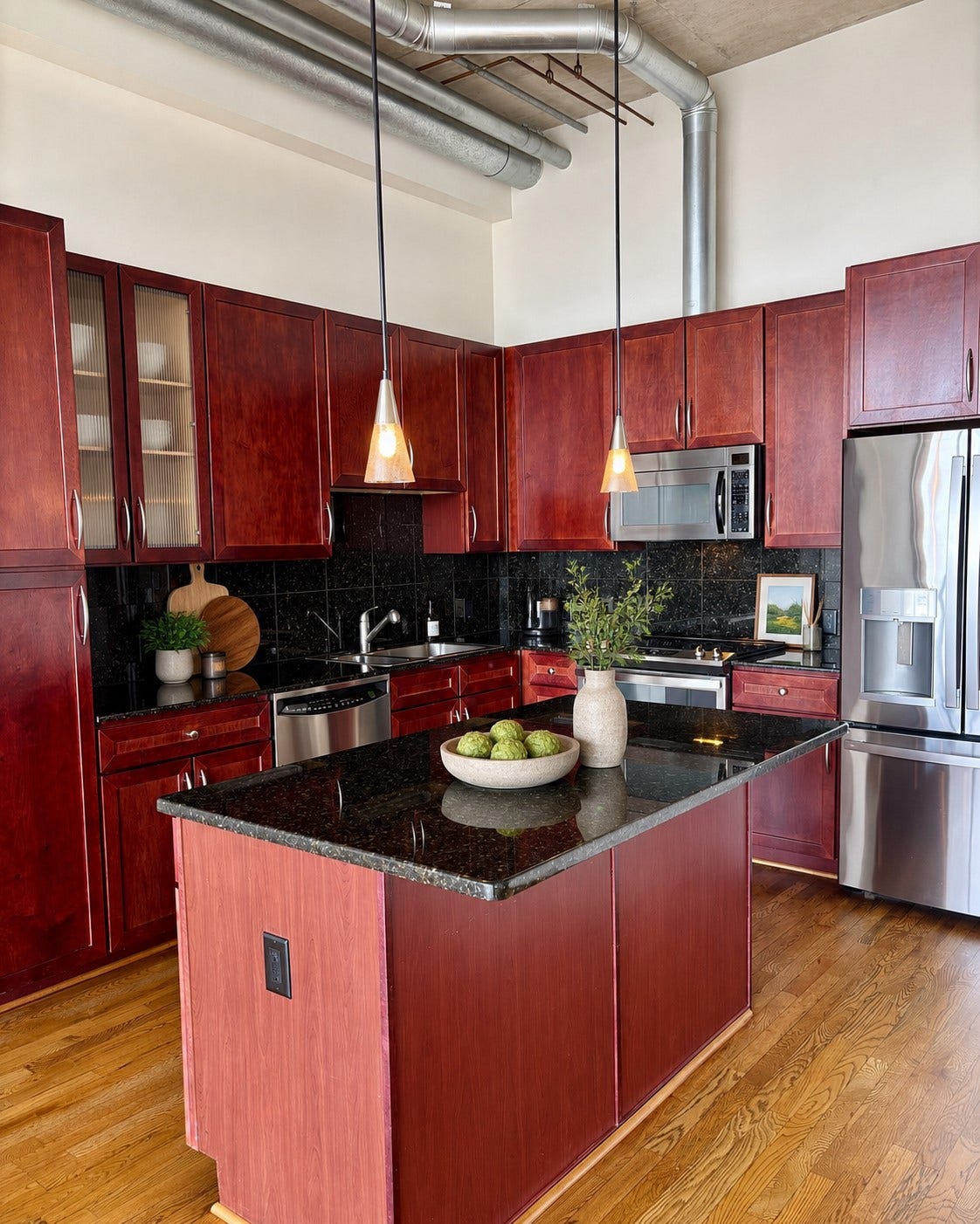 4899 Montrose Boulevard, #1009, Houston, TX 77006 Breakfast bar in the kitchen. Hanging light fixtures and over/under cabinets lights. Stainless steel appliances and abundant storage!