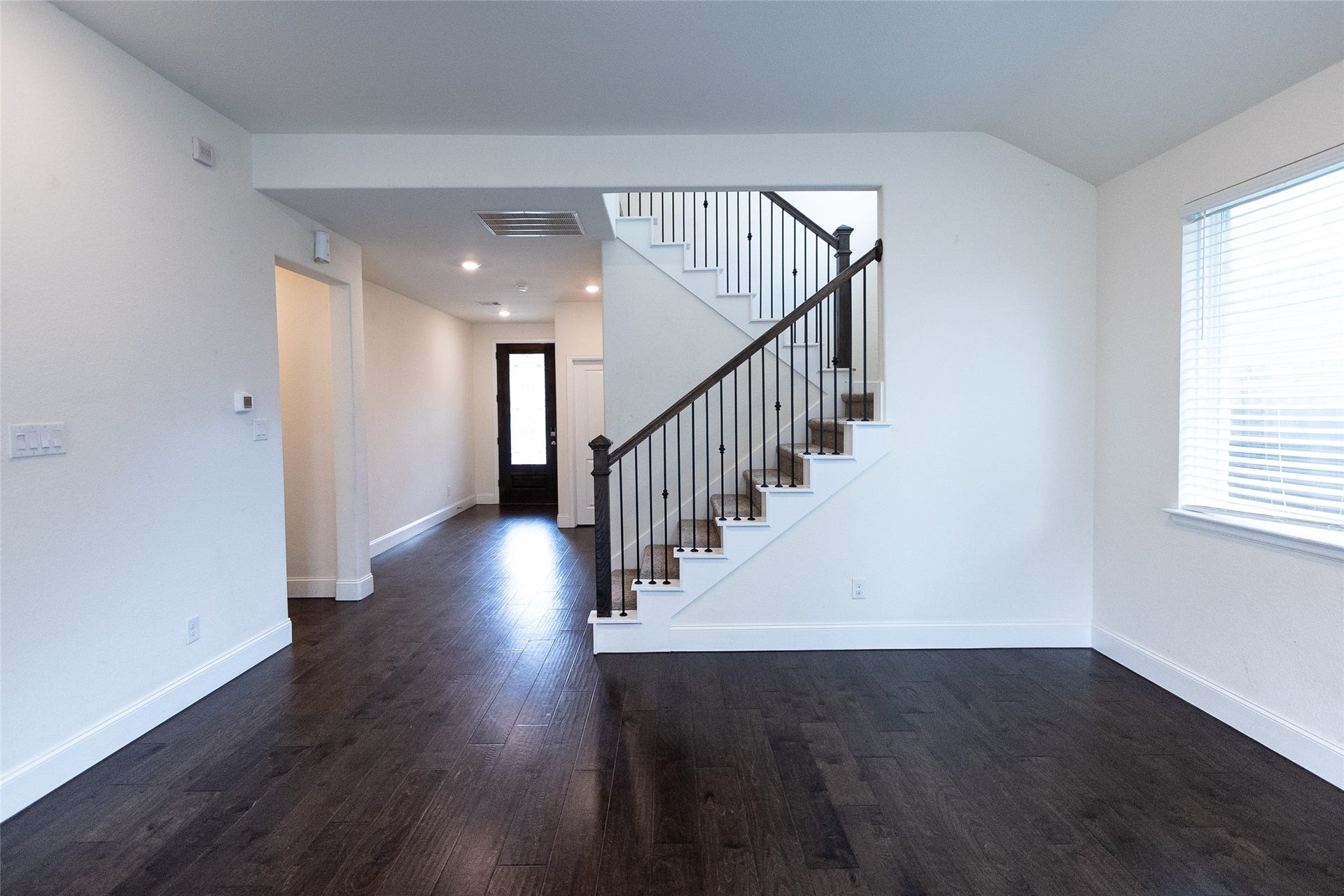 DINING AREA NEXT TO STAIR CASE