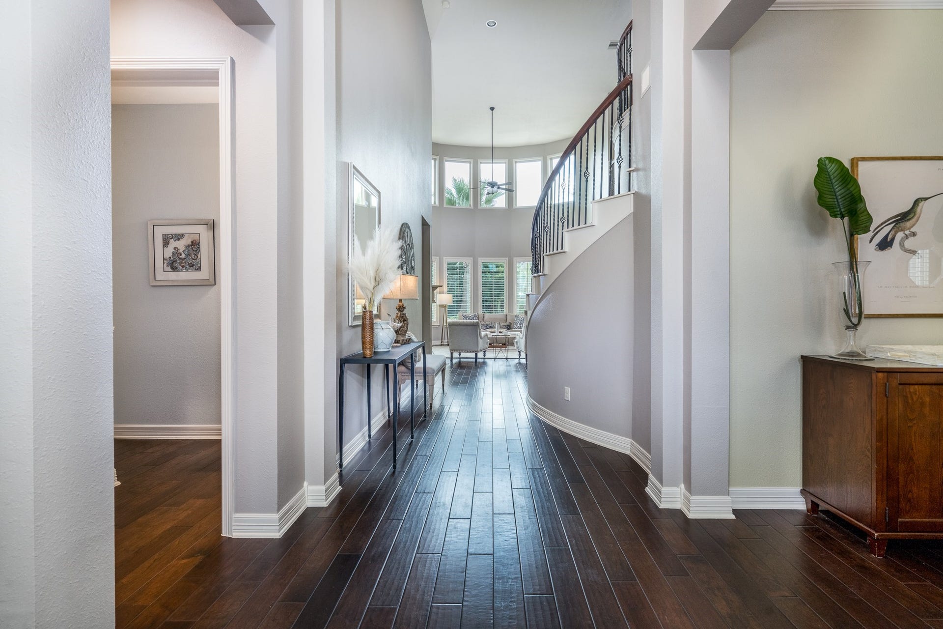Step inside this 2 story entry with gorgeous hardwood floors that flow through the main living areas, creating a warm and welcoming space!