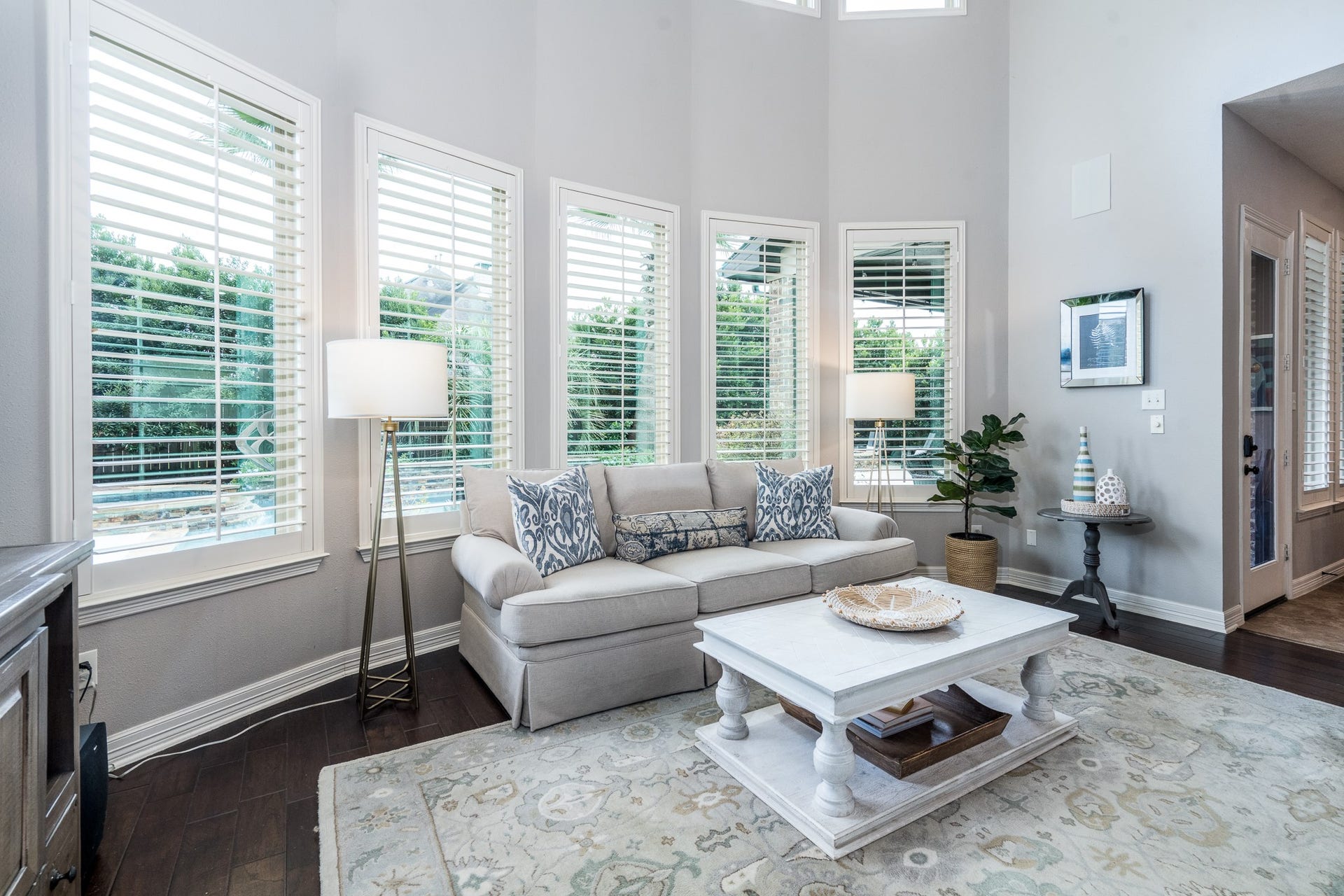 The expansive family room offers the ideal gathering place to cozy up by the fire, take in a movie or entertain a crowd...not to mention the views!