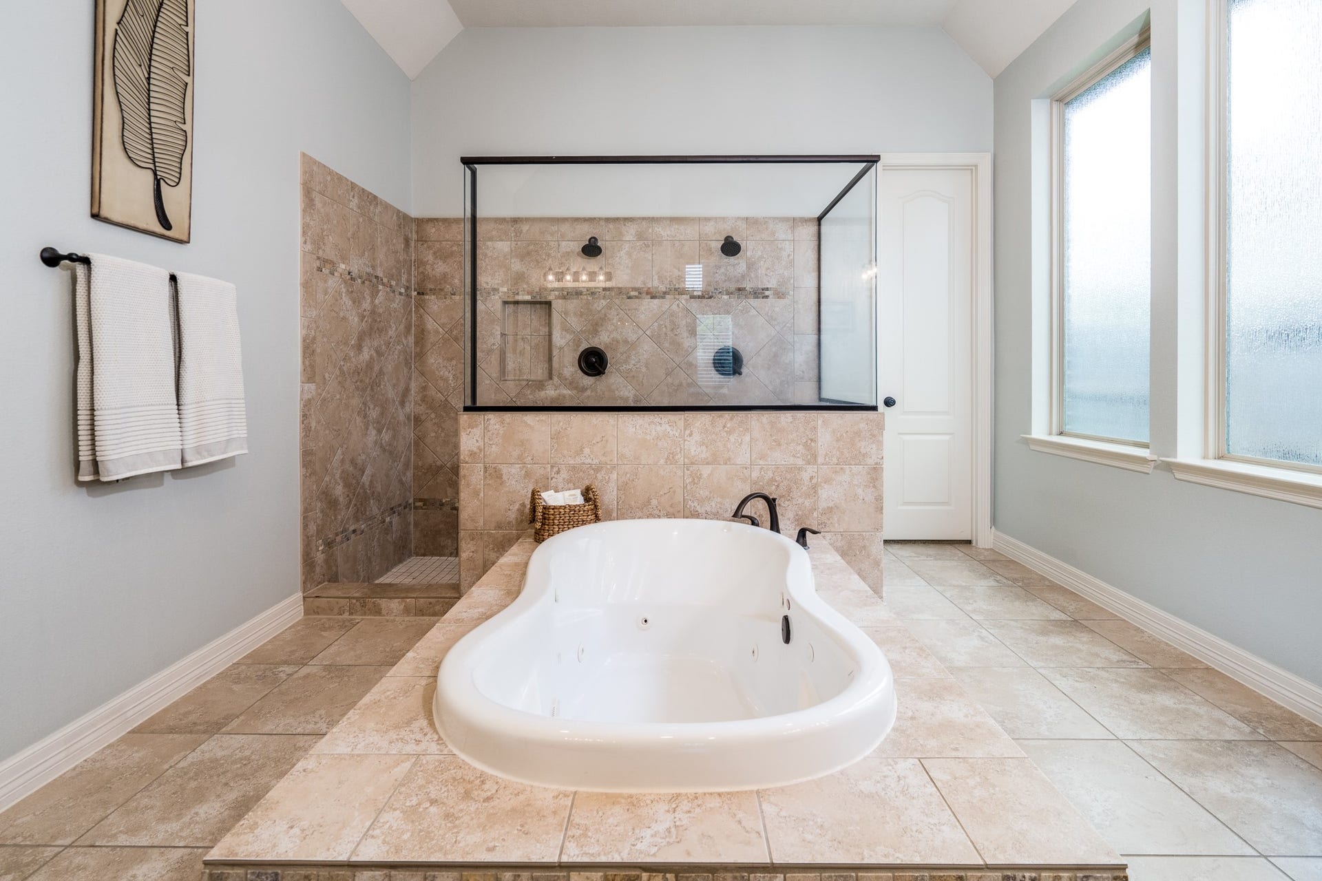 No better place to start or end your day! Do you prefer bubbles or steam? A glass enclosed shower and soaker tub offers you the choice!