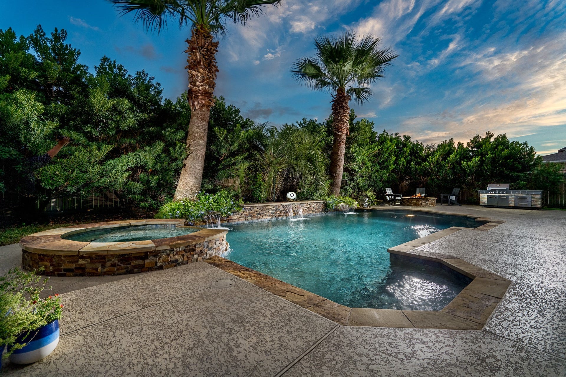 Resort style living awaits in this amazing backyard! Imagine twilight swims in this spectacular space!