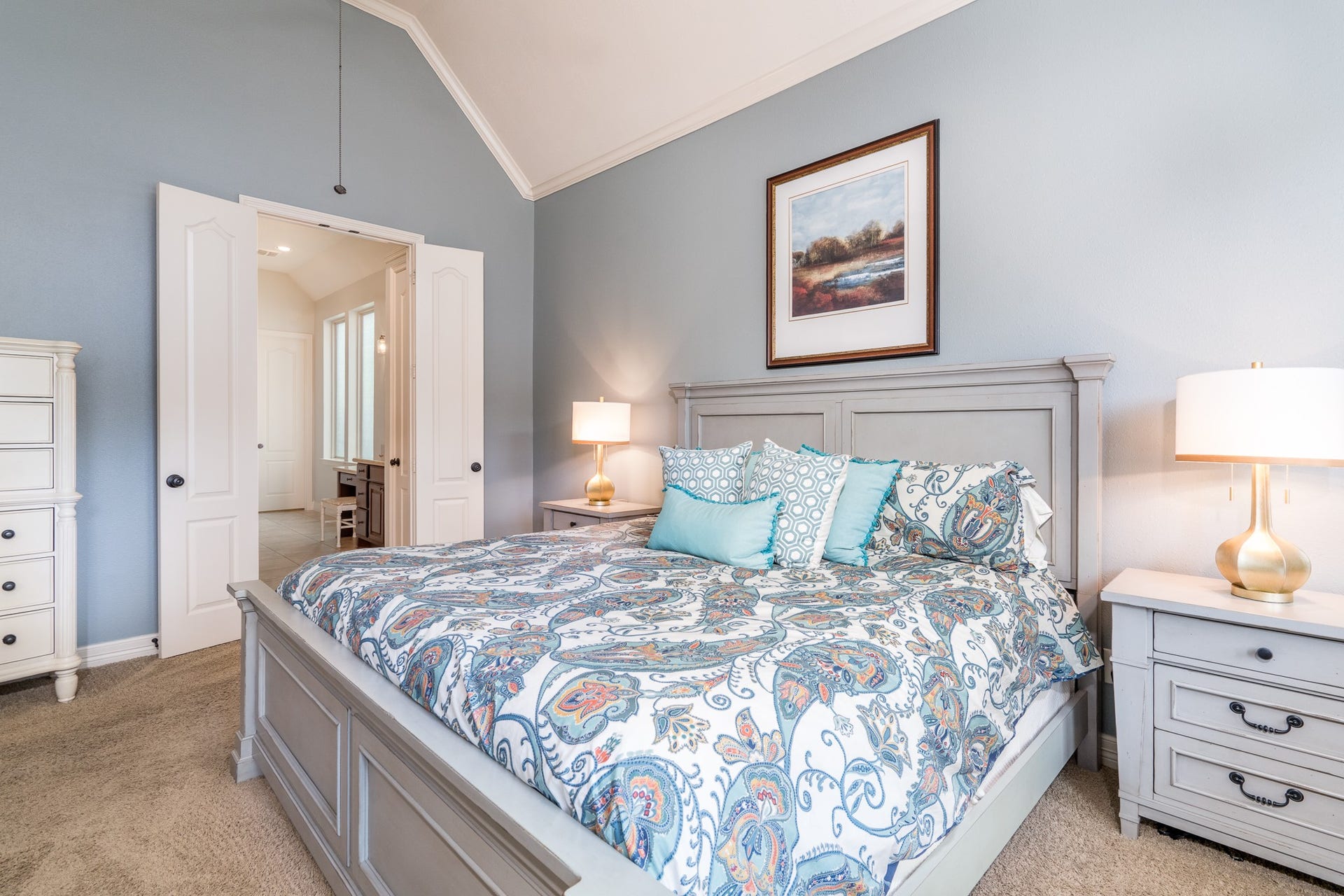 Neutral paint and soft carpet underfoot offer the perfect owner's retreat after a long day!