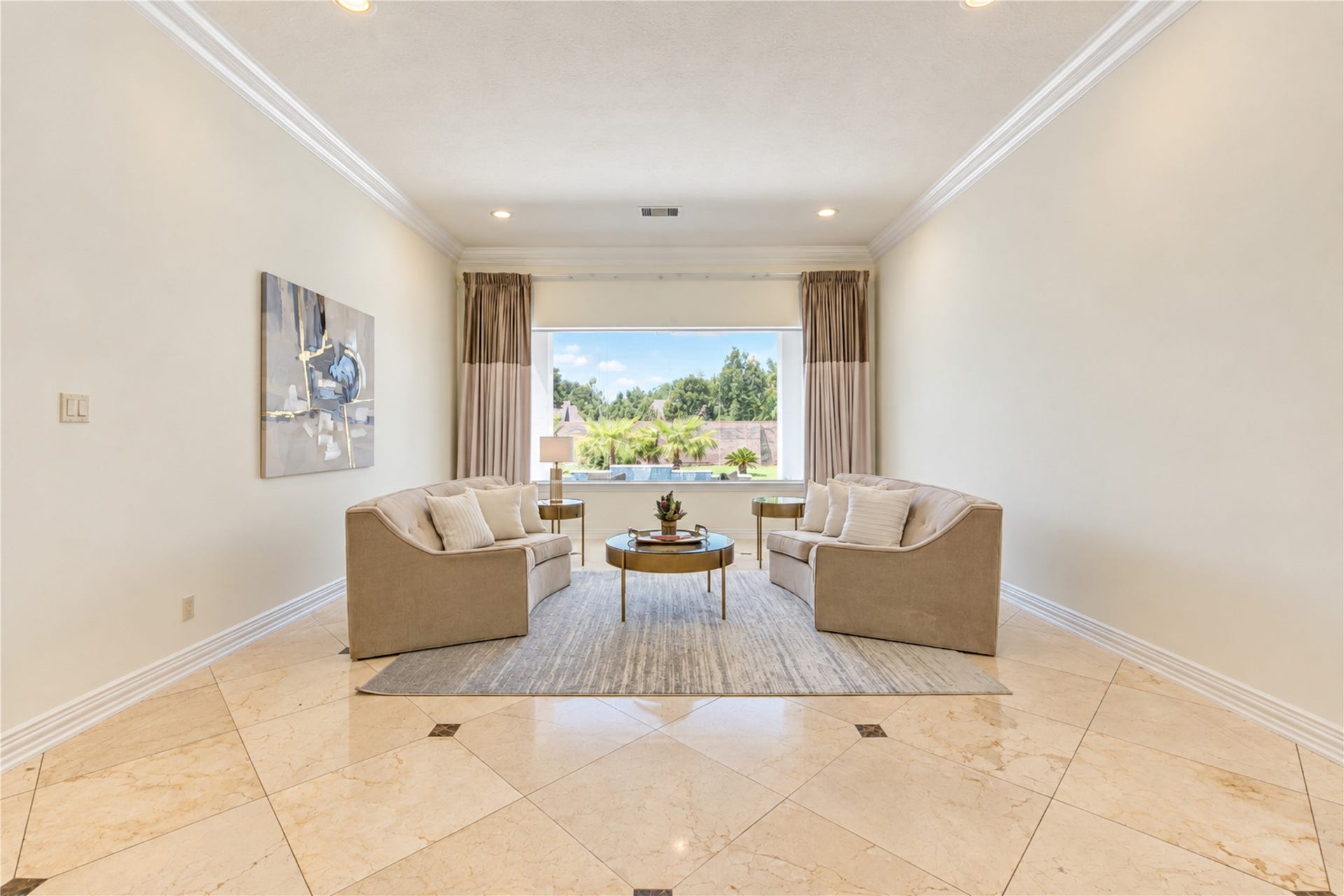 14014 Hampton Cove Drive, Houston, TX 77077 Stunning formal living area featuring an unobstructed view of the pool, perfect for your next gathering.