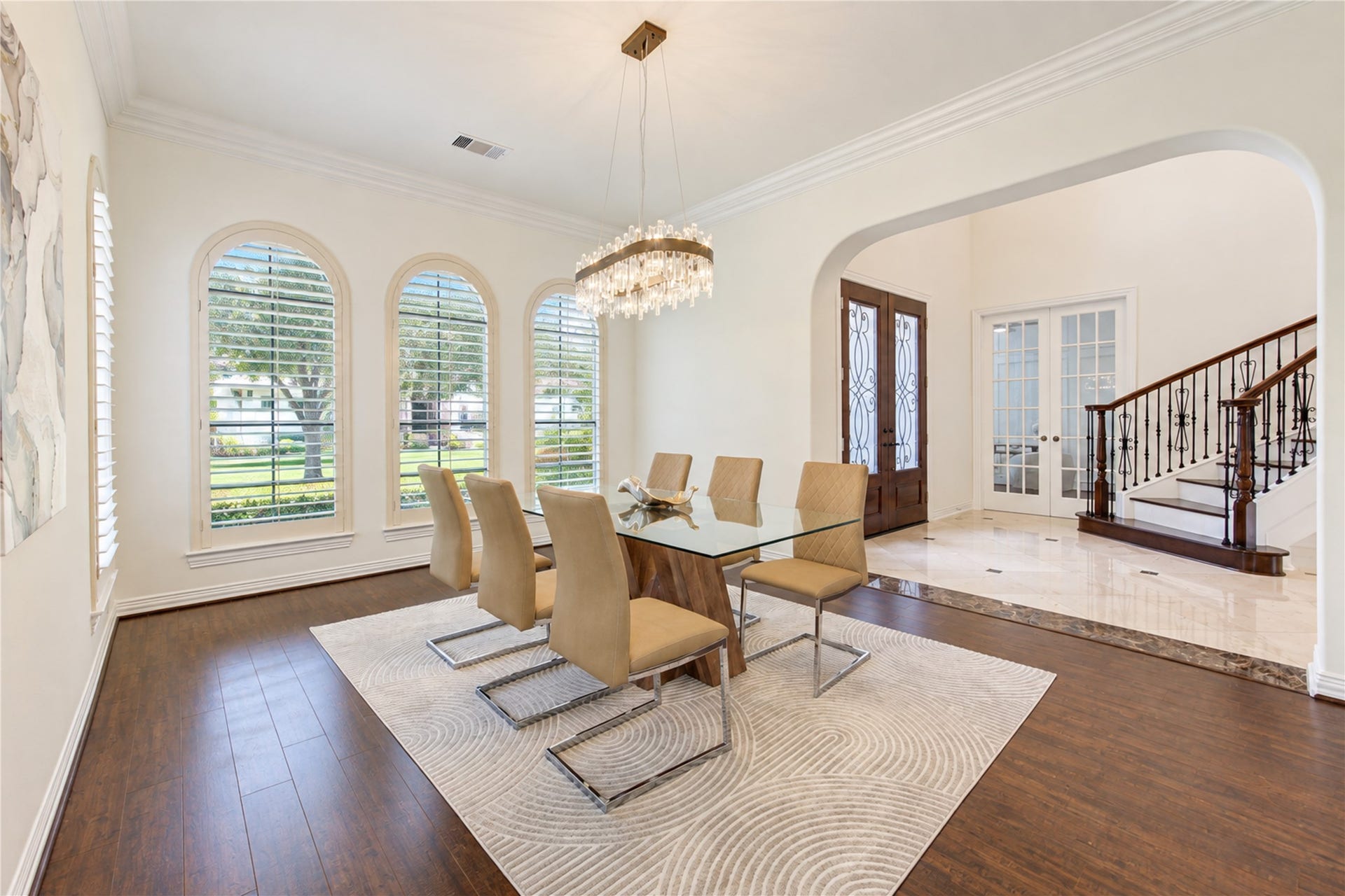 14014 Hampton Cove Drive, Houston, TX 77077 This dining area is filled with natural sunlight and offers convenient, seamless access to both the kitchen and formal living spaces.