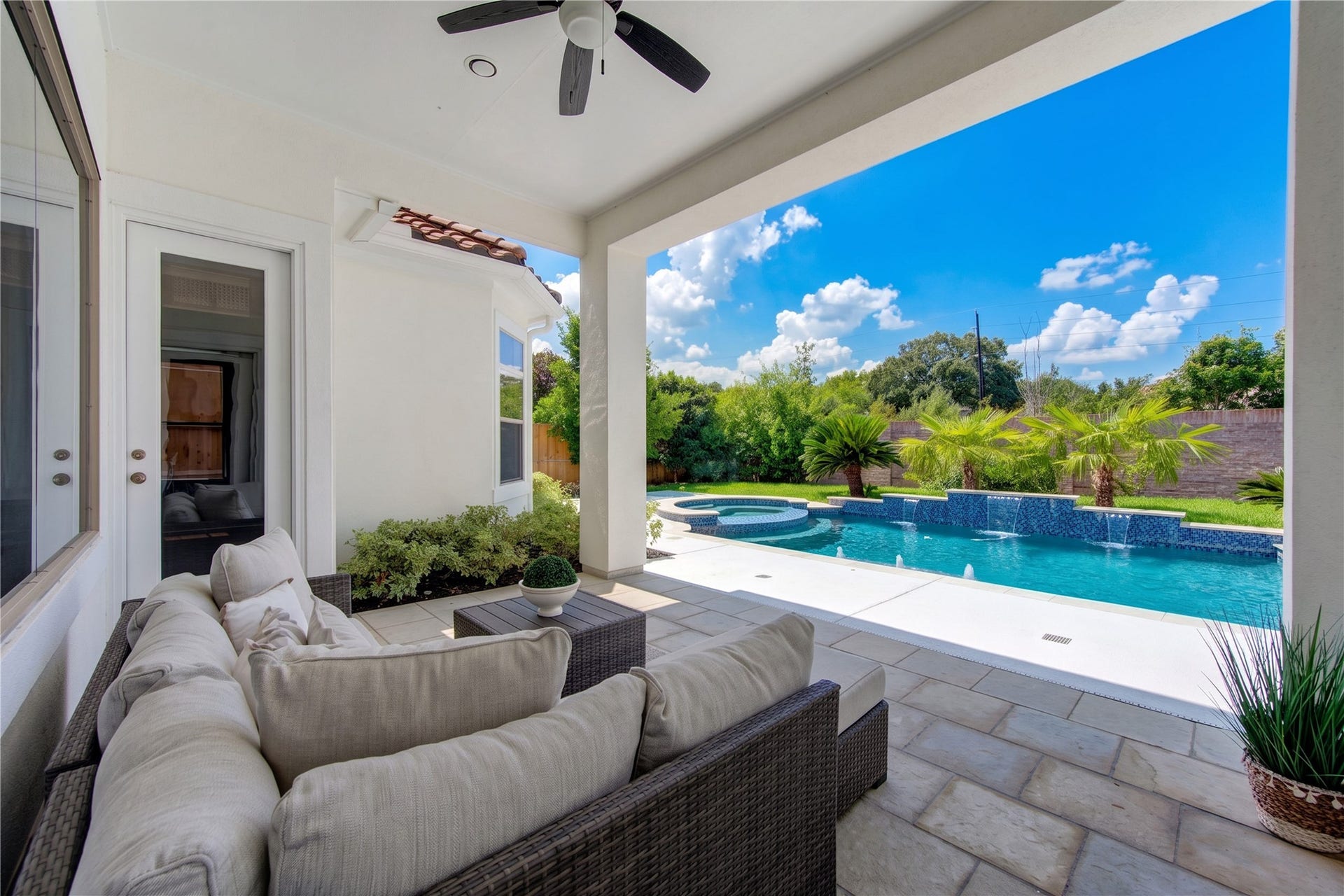 14014 Hampton Cove Drive, Houston, TX 77077 Covered patio perfect for enjoying your pool all day long.