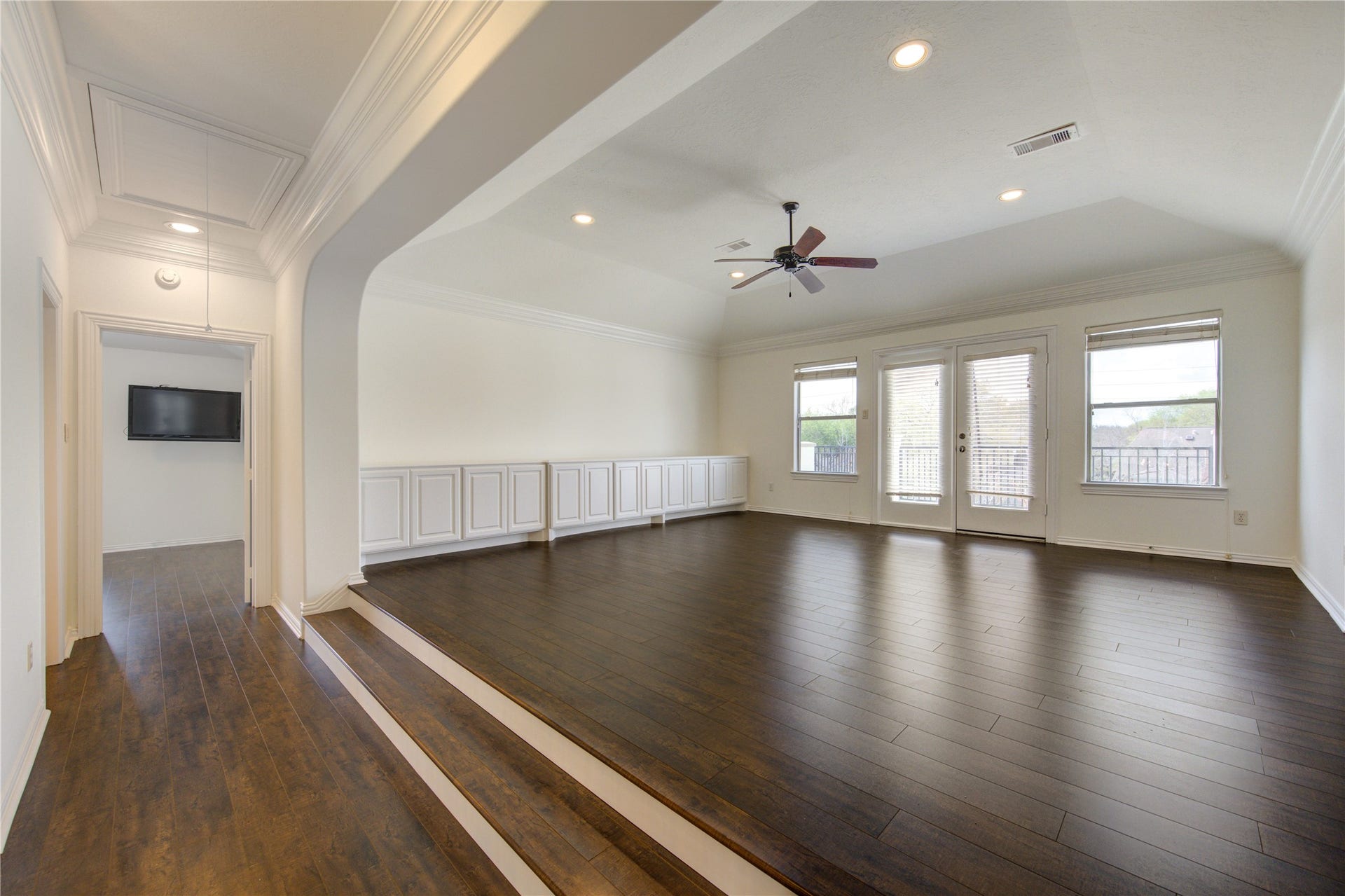 14014 Hampton Cove Drive, Houston, TX 77077 Oversize garage featuring brand-new flooring and custom cabinetry, perfectly designed for hosting and entertainment.