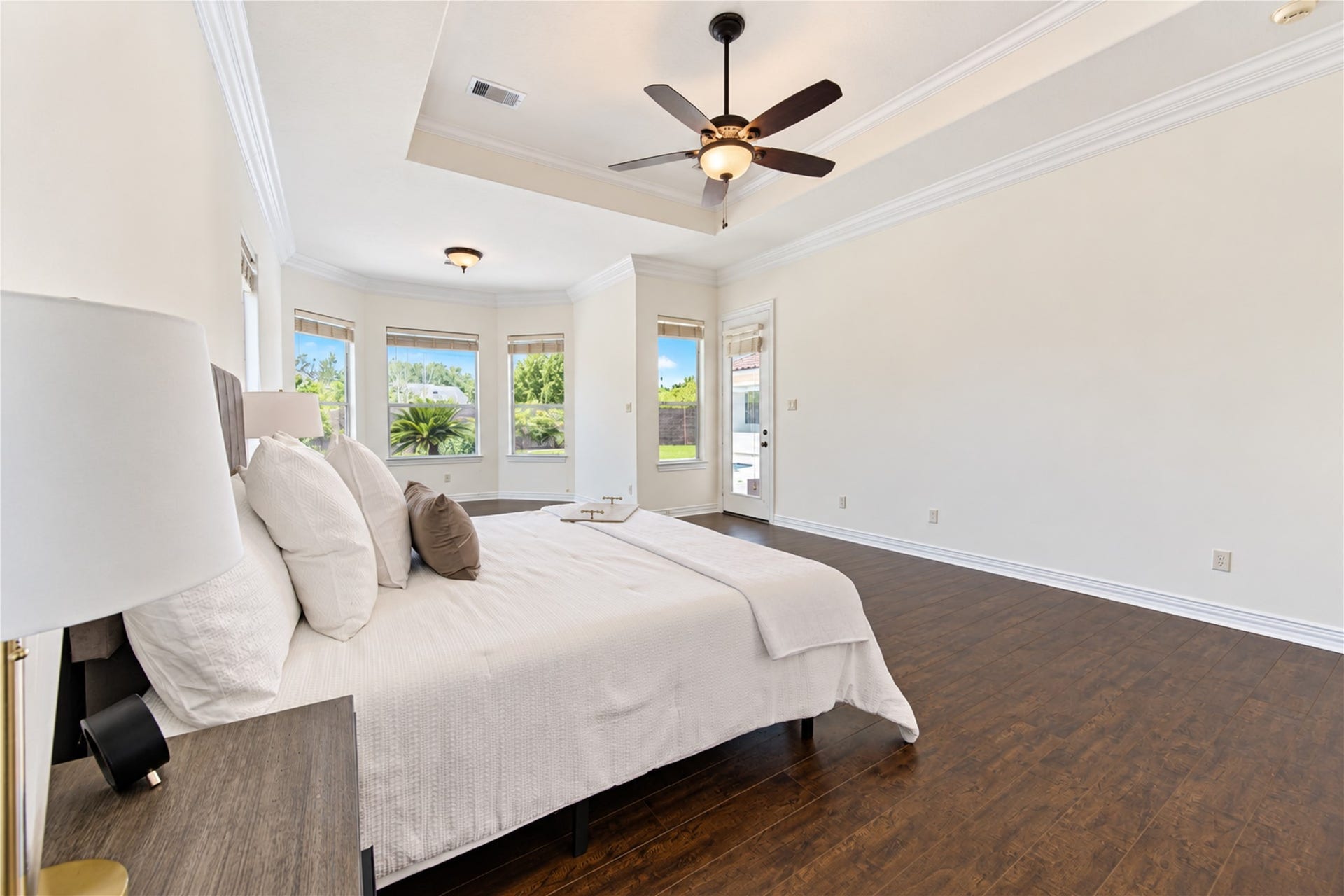 14014 Hampton Cove Drive, Houston, TX 77077 Spacious primary suite featuring brand-new flooring and direct access to the private pool.