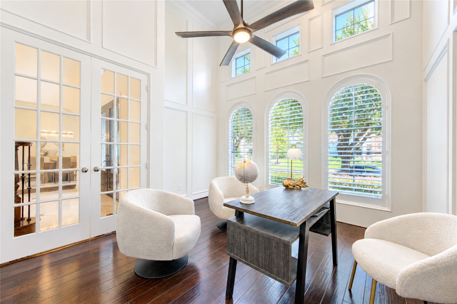 14014 Hampton Cove Drive, Houston, TX 77077 This stunning home office offers the perfect blend of style and productivity, featuring professional-grade finishes and abundant natural light to create an ideal workspace.