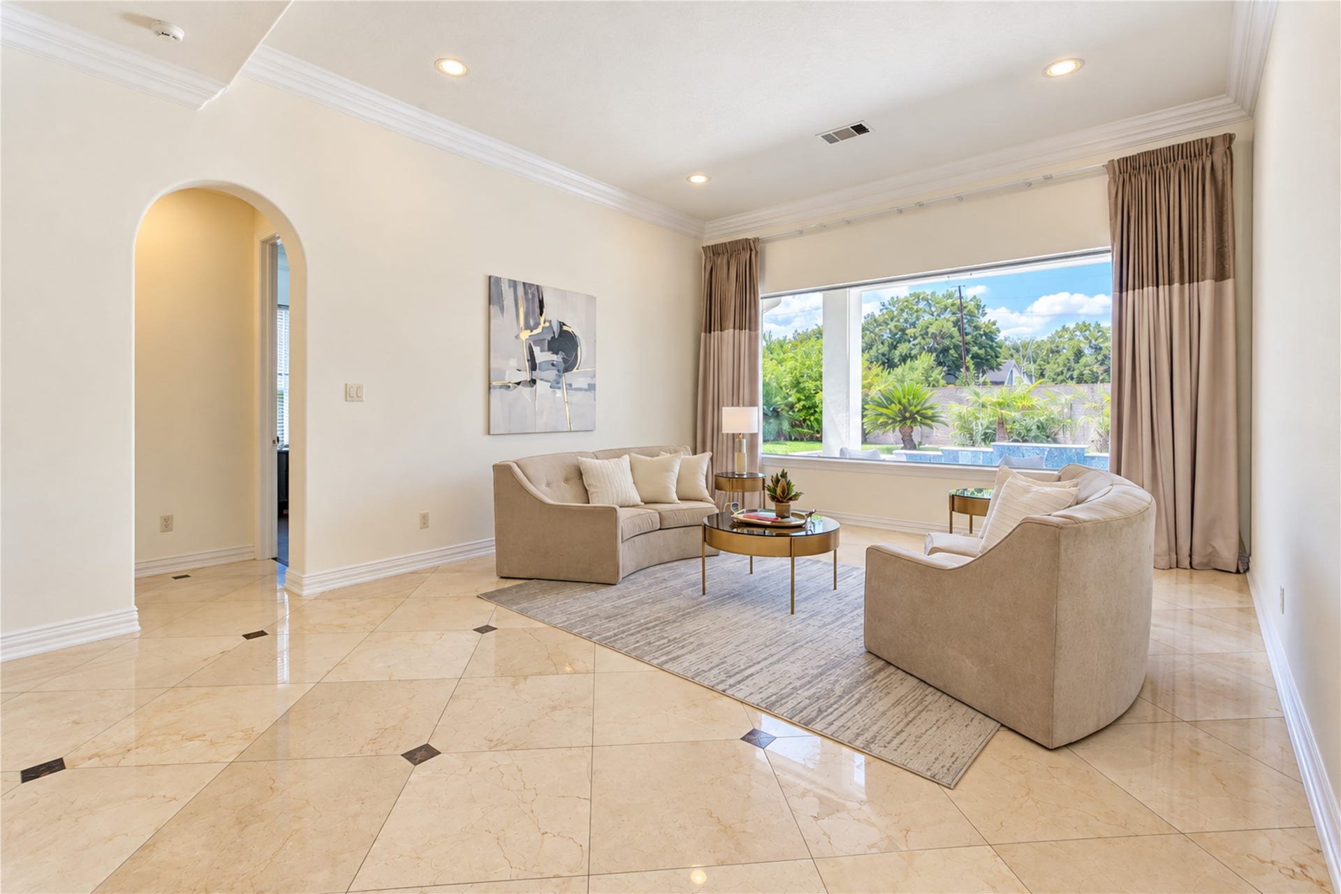 14014 Hampton Cove Drive, Houston, TX 77077 Stunning formal living area featuring an unobstructed view of the pool, perfect for your next gathering.