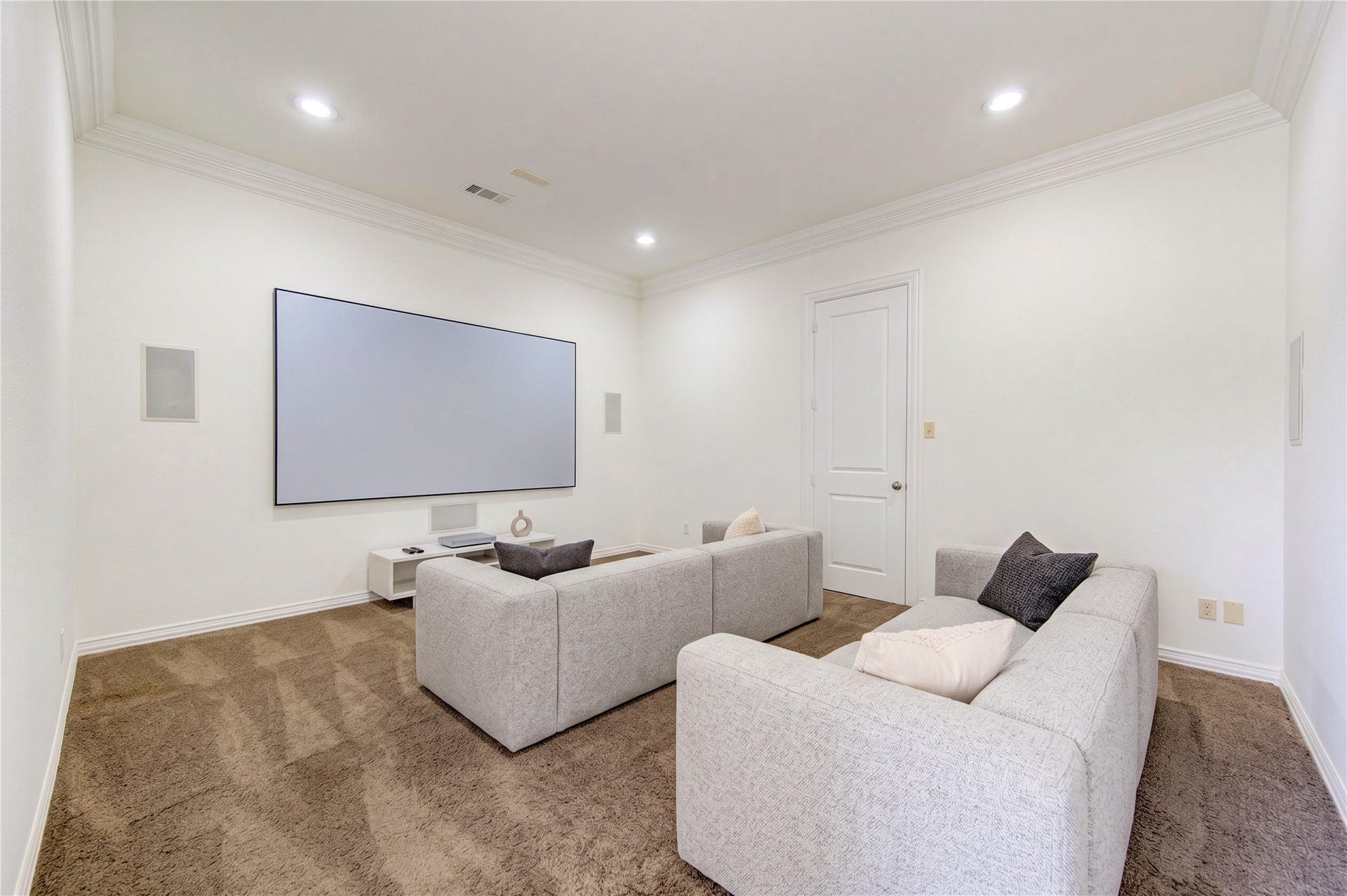 14014 Hampton Cove Drive, Houston, TX 77077 This first-floor media room is perfect for family movie nights.