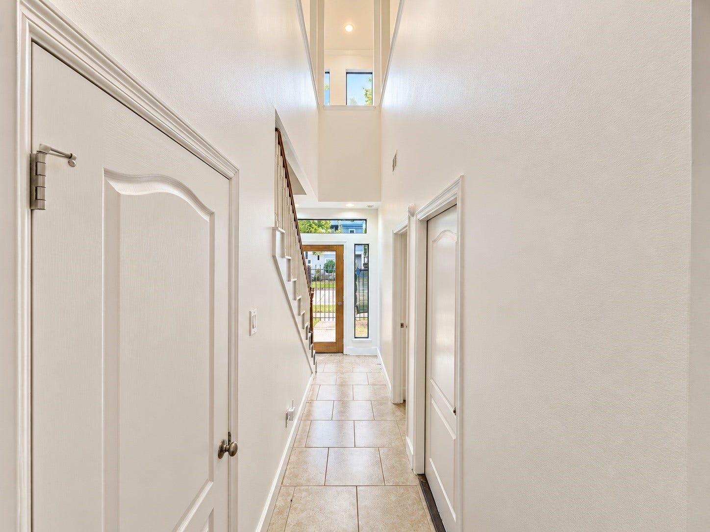 2118 Holman Street, Houston, TX 77004 First floor hallway leading from the utility room/garage and first floor bedroom.