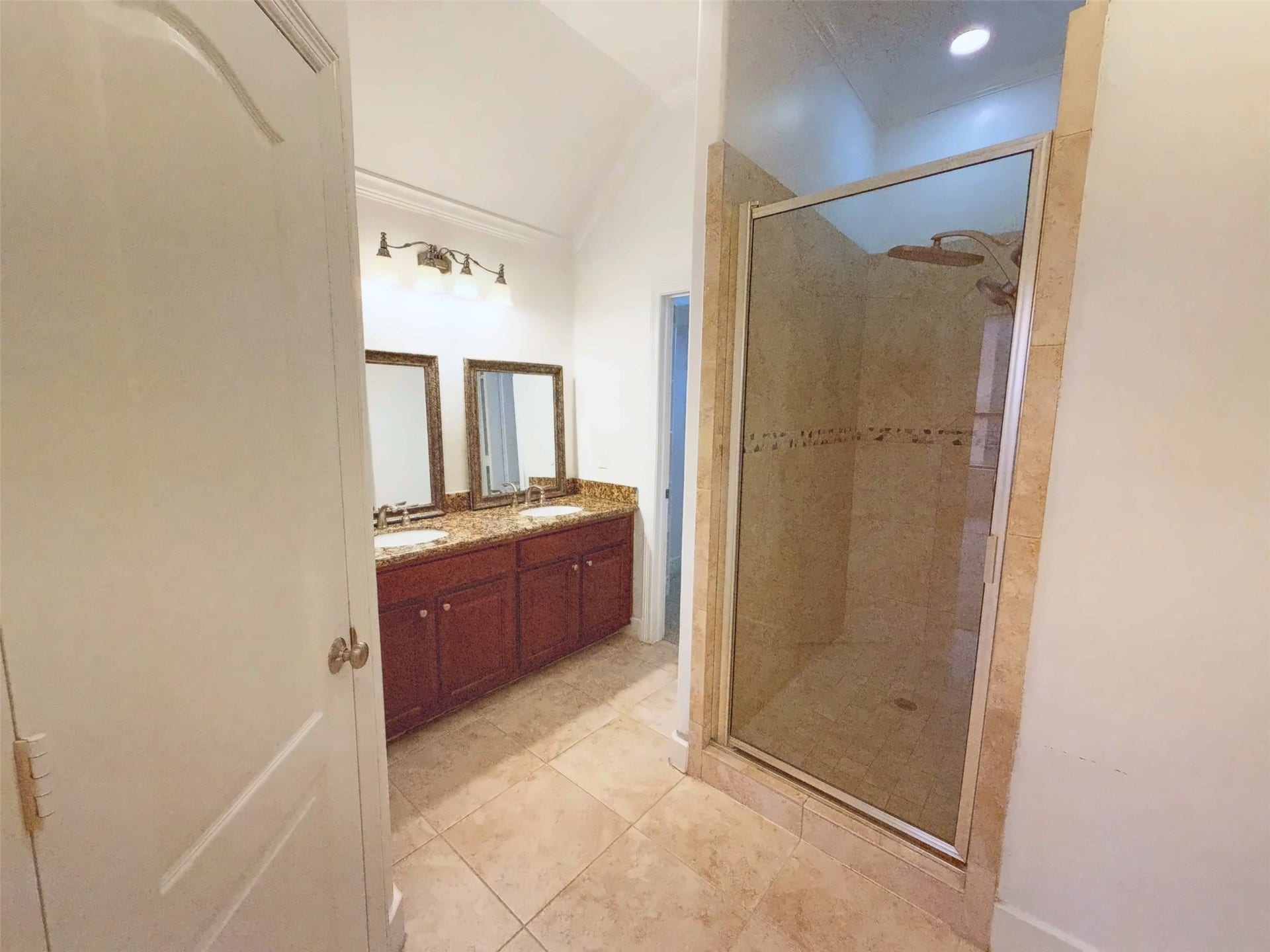 2118 Holman Street, Houston, TX 77004 Primary has a double sink area with separate shower.