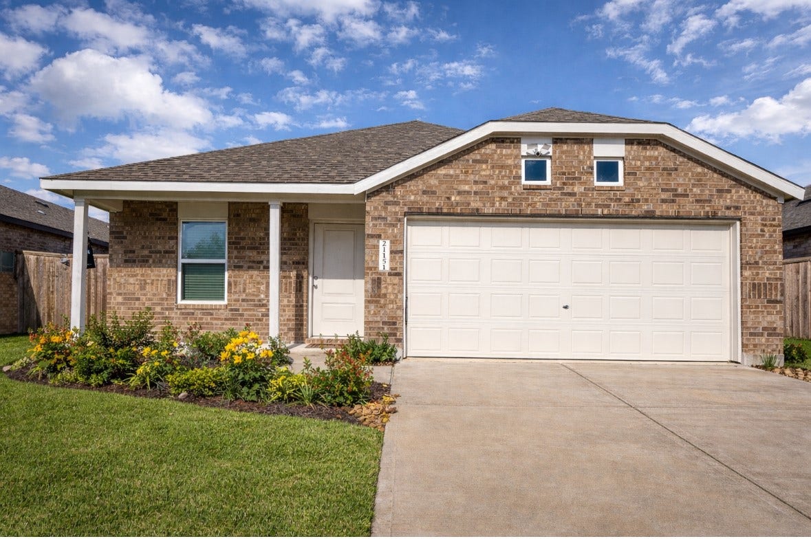 21151 Vercelli, New Caney, TX 77357 Beautifully maintained single-story home with attractive brick exterior, covered front porch, and inviting curb appeal. A wide driveway and two-car garage provide convenience, while the landscaped front yard adds warmth and charm