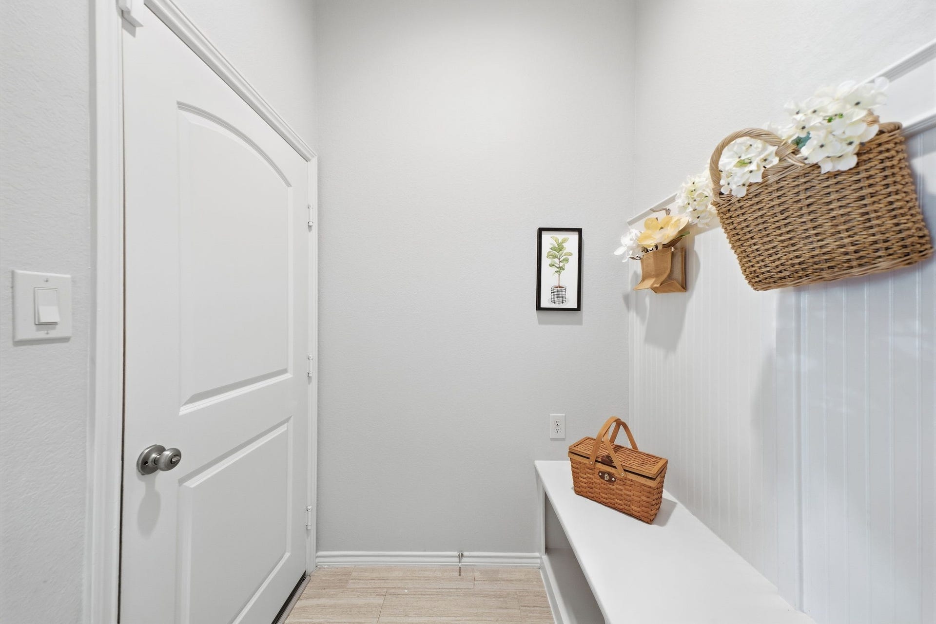 2903 Thornridge Bend Court, Pearland, TX 77584 Enter the home from the 2-car garage to a functional mud room with built in bench with hooks and storage