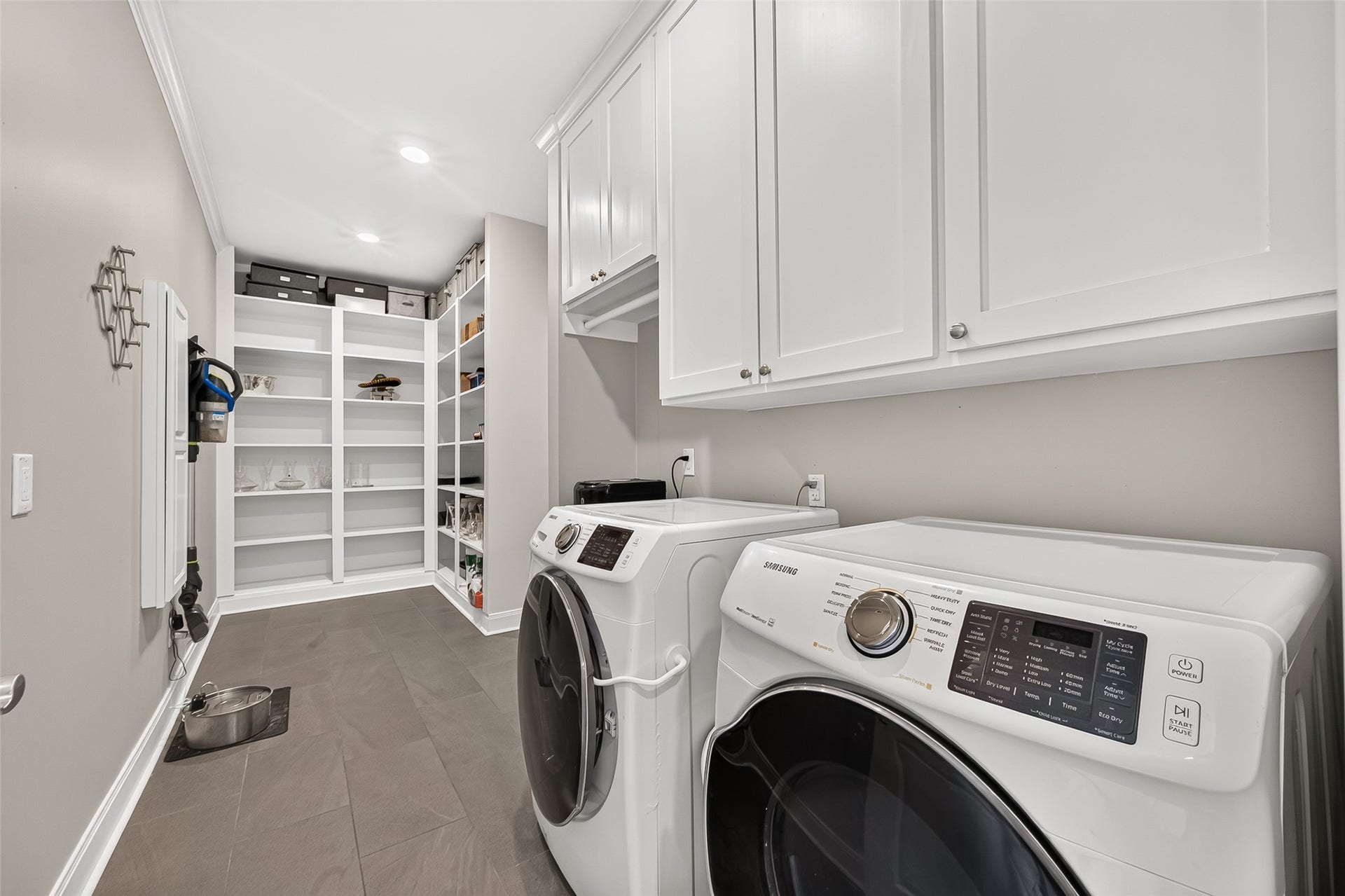 1122 Daria Drive, Houston, TX 77079 Large laundry room and pantry space - right off the kitchen.