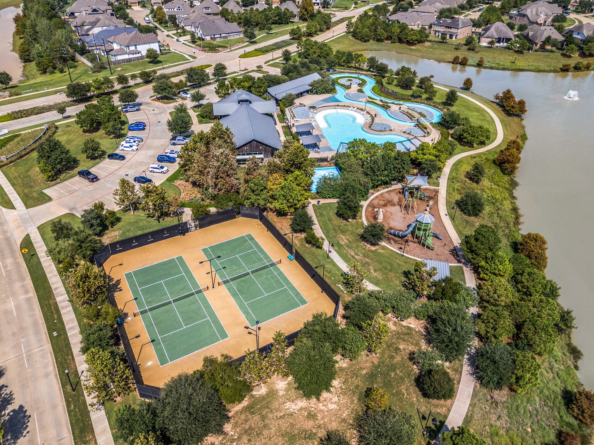 3026 Emerald Field Lane, Fulshear, TX 77423 Tennis courts, playground, and walking lake trails