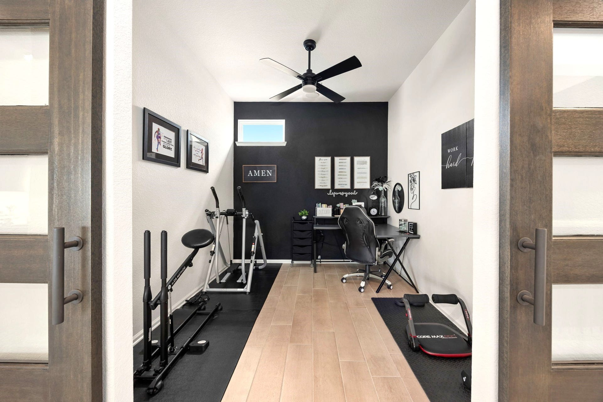 3026 Emerald Field Lane, Fulshear, TX 77423 A custom sliding barn door opens to a versatile flex room, ideal for a guest bedroom, private home office, fitness studio, or creative retreat, offering exceptional flexibility to accommodate your lifestyle and evolving needs.