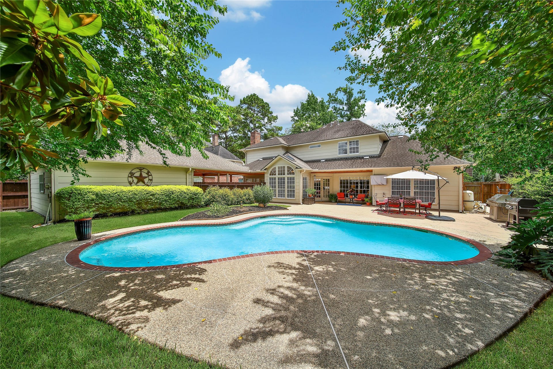 WHO NEEDS AN UPSTAIRS GAME ROOM WHEN THE BACKYARD IS THE DESTINATION?