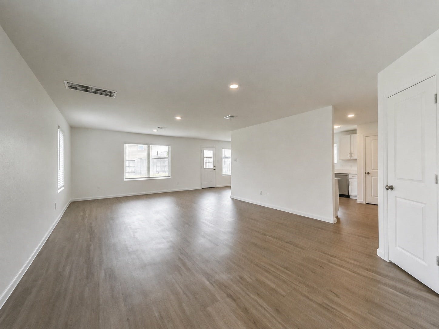 Living Room from entry with hall closet to the left.