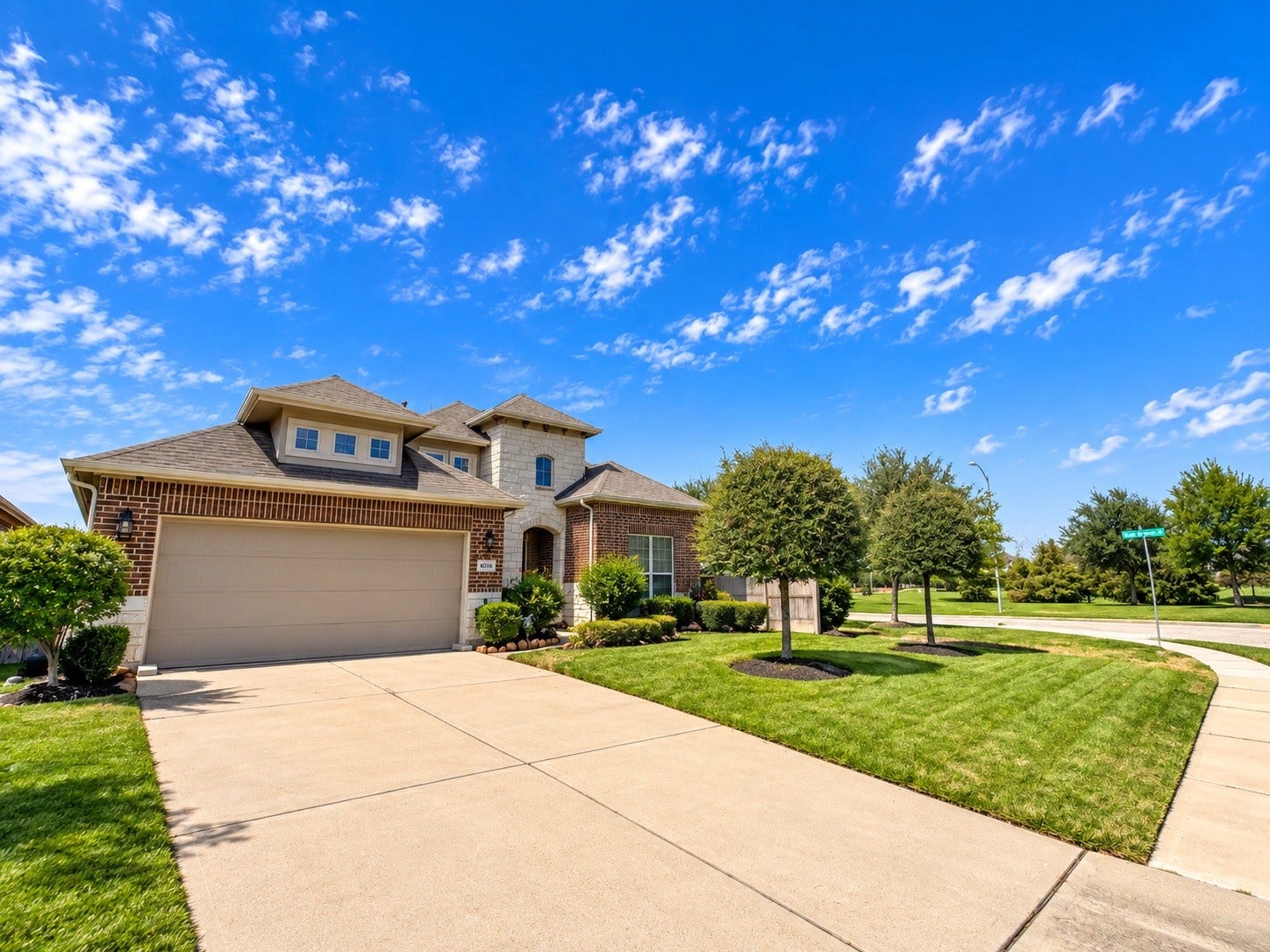 8006 Duncan Ranch Lane, Richmond, TX 77407 Charming brick elevation create stunning curb appeal and a warm.