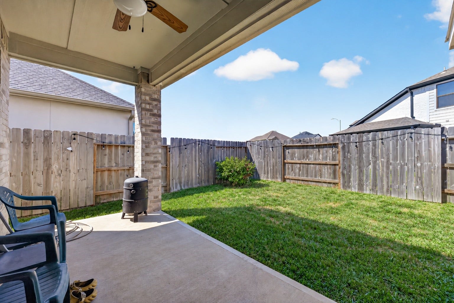 Covered Patio overlooking backyard