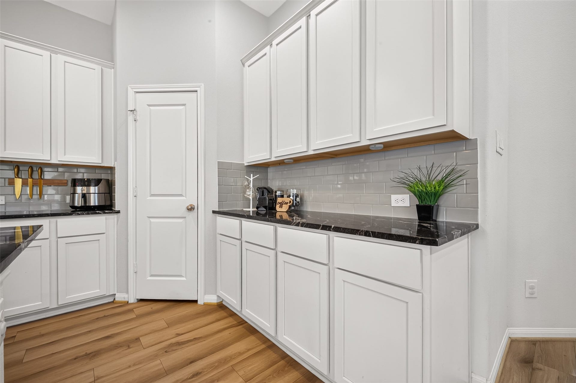 Open Concept Kitchen with Granite Counter Tops, SS Appliances and Large Serving Island amazing for entertaining.