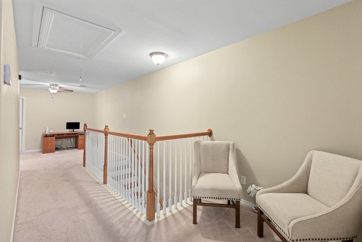 Upstairs are two landing nooks! Perfect for an additional reading area!