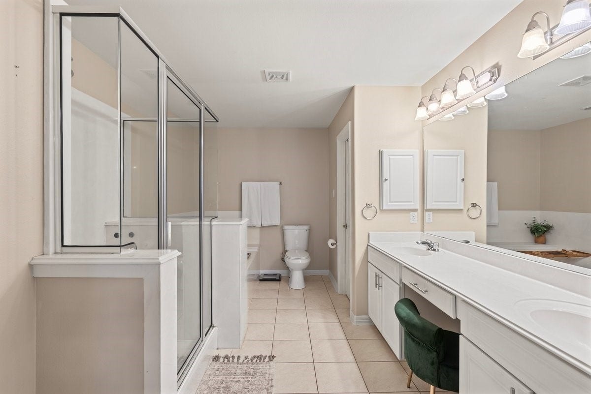 The spa-like primary bathroom is incredibly large!