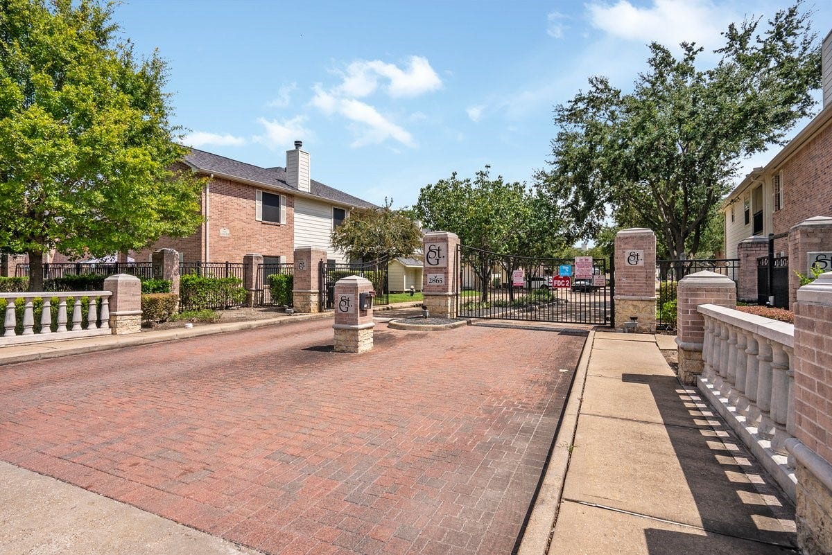 Adding to its charm and character, this town home is located within a gated community!