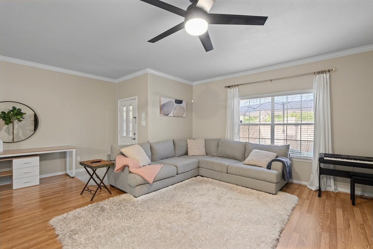Envision gathering with loved ones in this enormous living room!