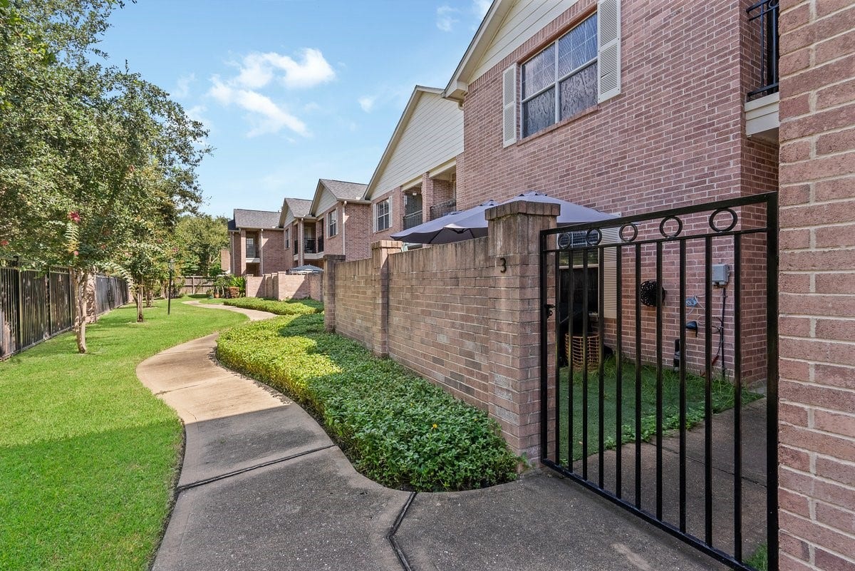 Nestled in a charming community, this neighborhood has many walkways and mature landscaping