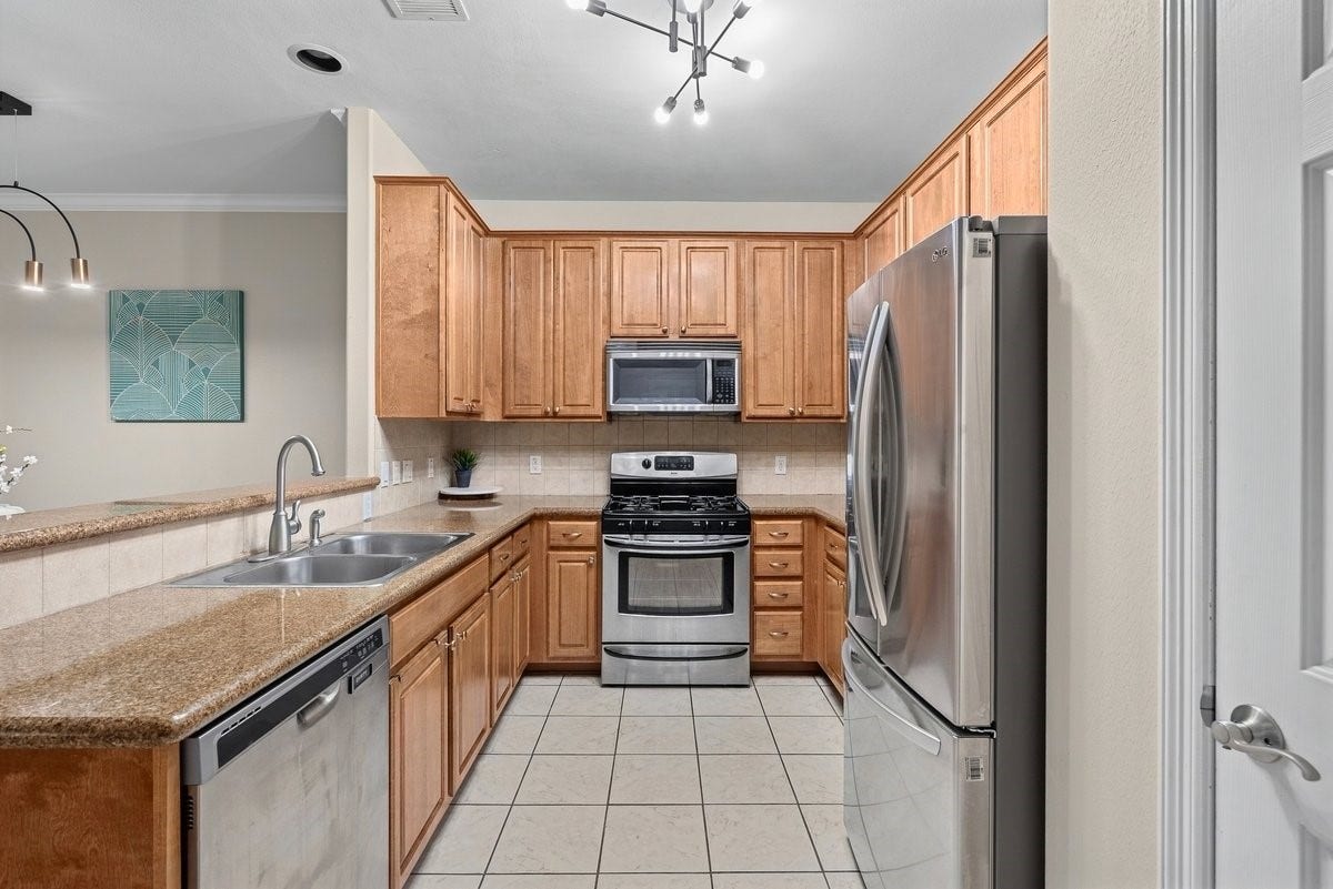 The chef of the home will love the abundance of cabinetry, stainless steel appliances and counter space!
