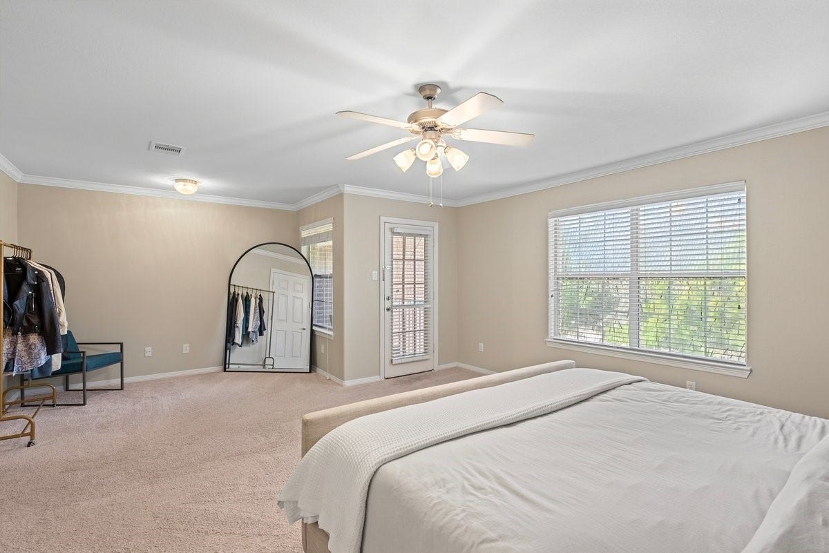 The generously sized primary suite has an additional seating area, offering even more space for your personal items!