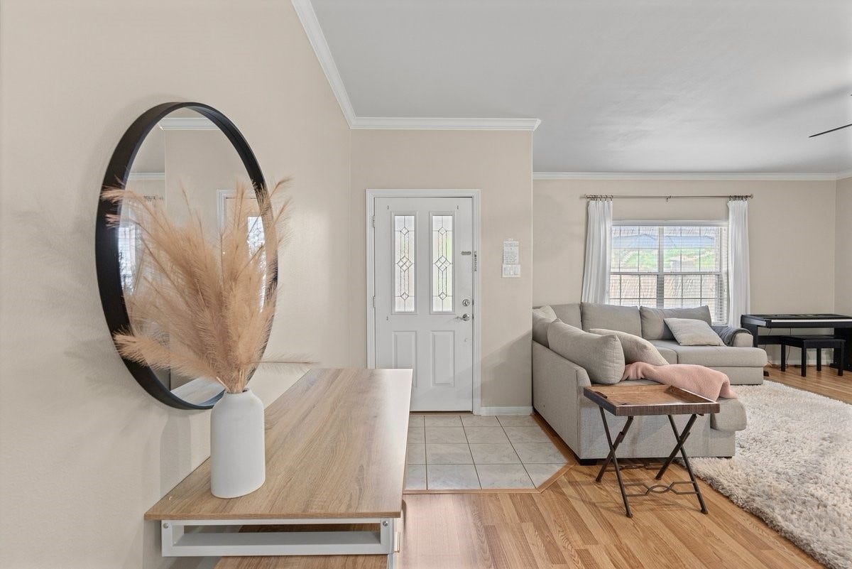 Your guests will be amazed upon entering at the high ceilings, neutral paint and natural light!