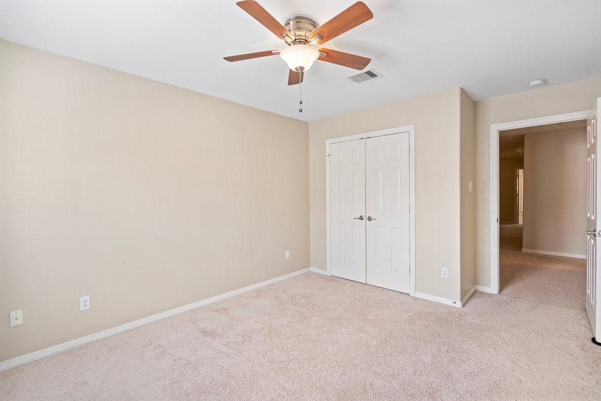 The split floor plan offers 2 additional bedrooms on the opposite side of the primary!