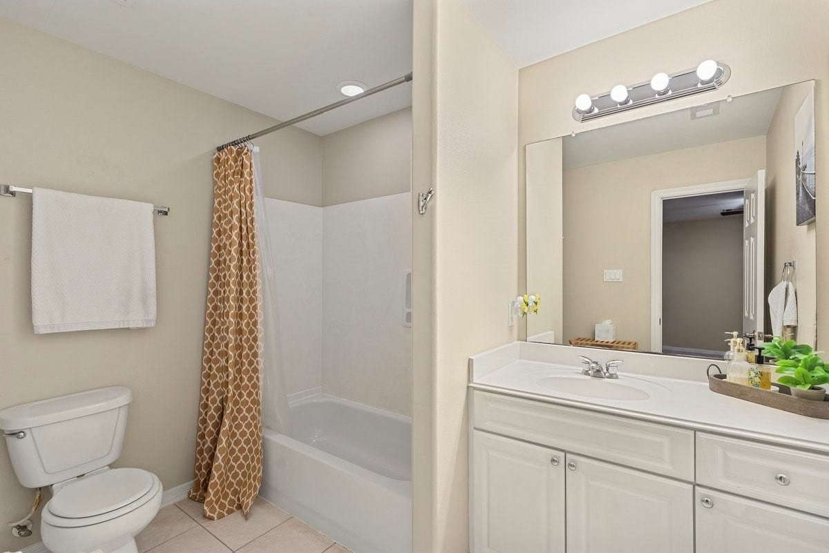 The hall bathroom offers a generous amount of counter space!