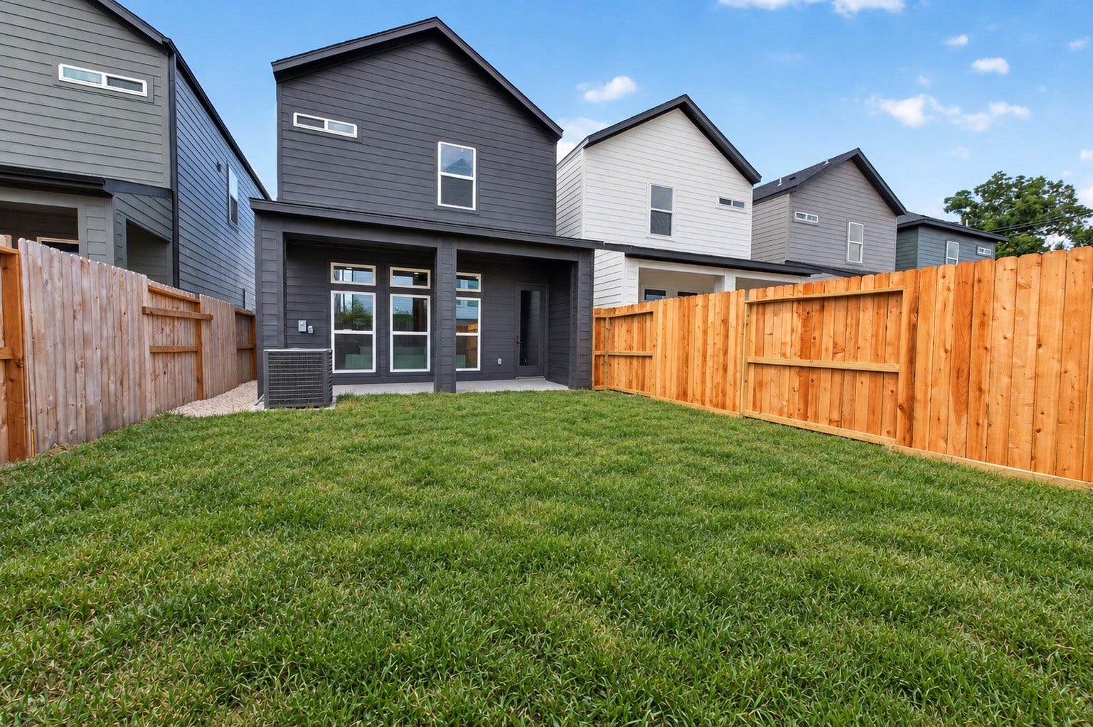 Spacious back yard is great for creating your own entertainment sanctuary.