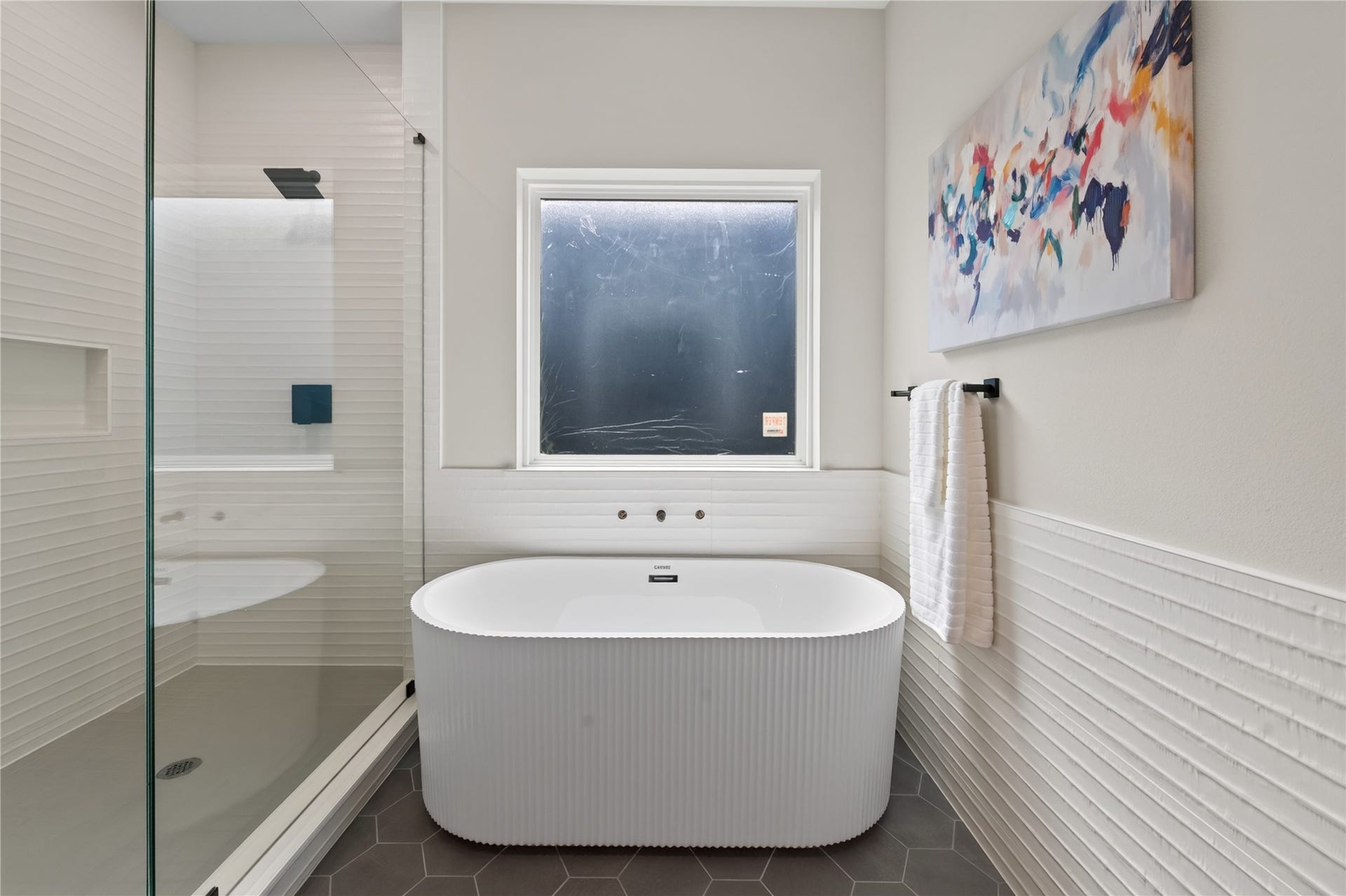 Separate shower & stand alone bath tub let you create your own oasis.