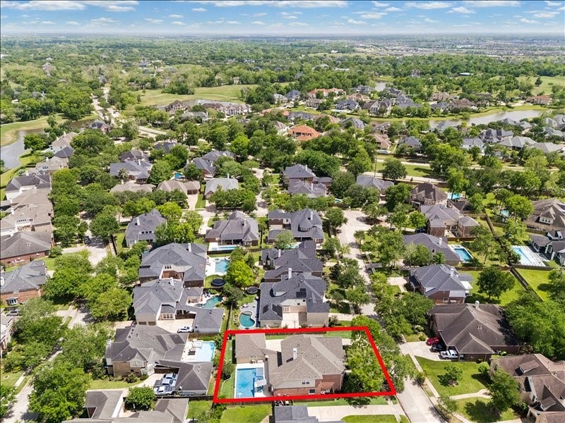 9007 Avebury Stone Circle, Missouri City, TX 77459 Elevated community view with property boundaries marked, illustrating the home's generous lot and desirable placement within this beautifully maintained, amenity-rich subdivision in Sienna Village of Waters Lake.