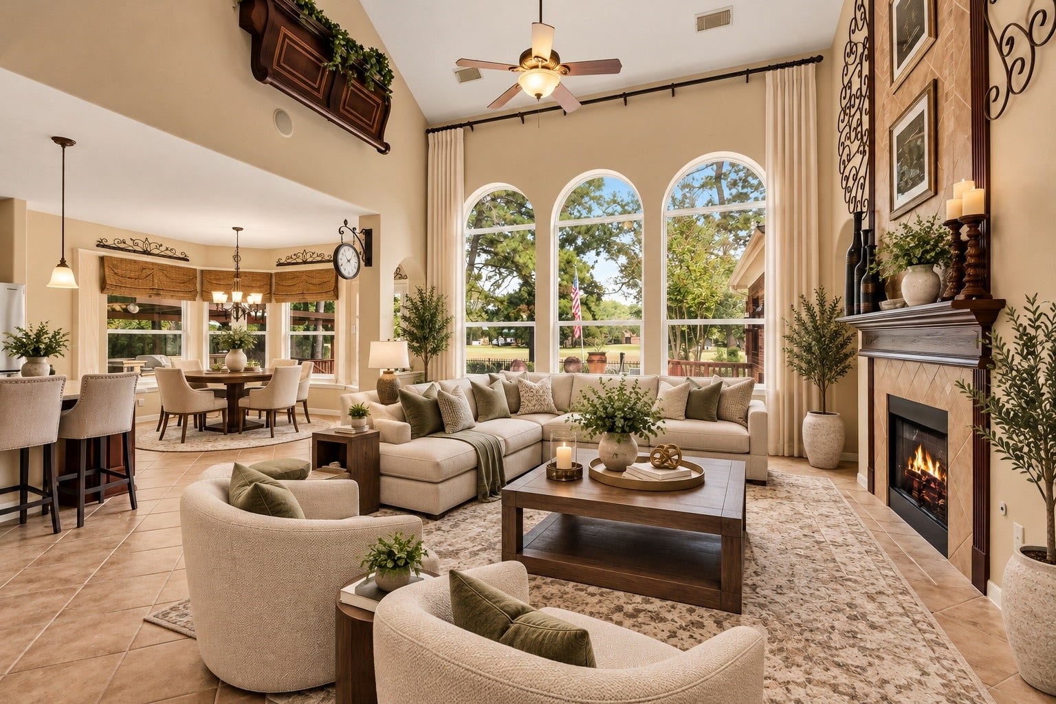 Virtually staged to showcase the beauty and spaciousness of this stunning two-story living area, featuring soaring ceilings, a cozy fireplace, and a seamless flow into the kitchen and charming breakfast nook.