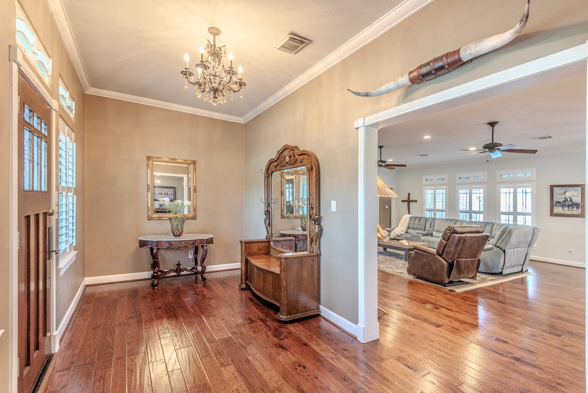 Large entry with engineered wood floors throughout