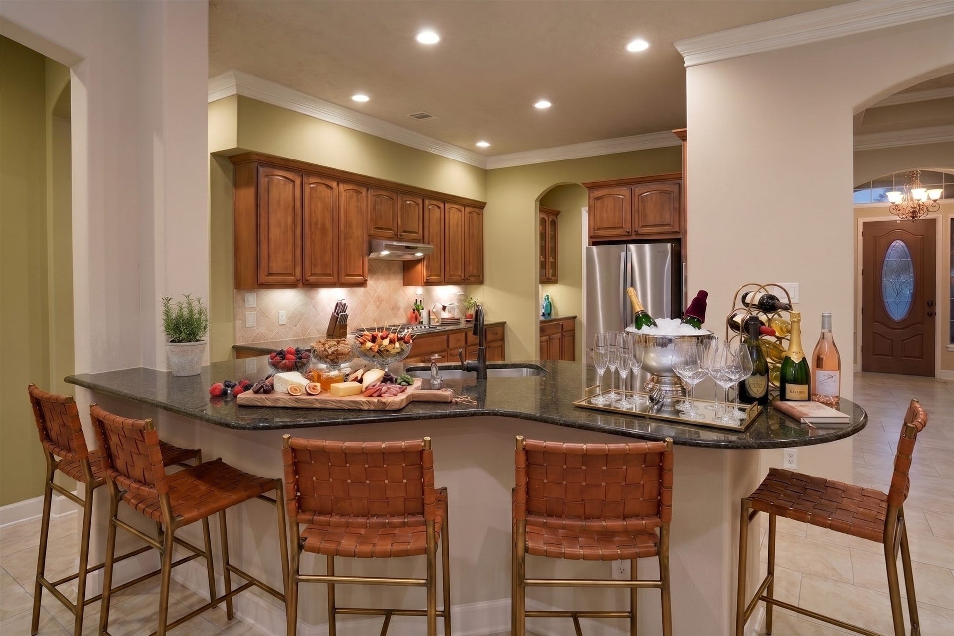 21214 Redcrest Manor Drive, Richmond, TX 77406 This sprawling kitchen island is an entertainer's dream come true! (virtually staged)