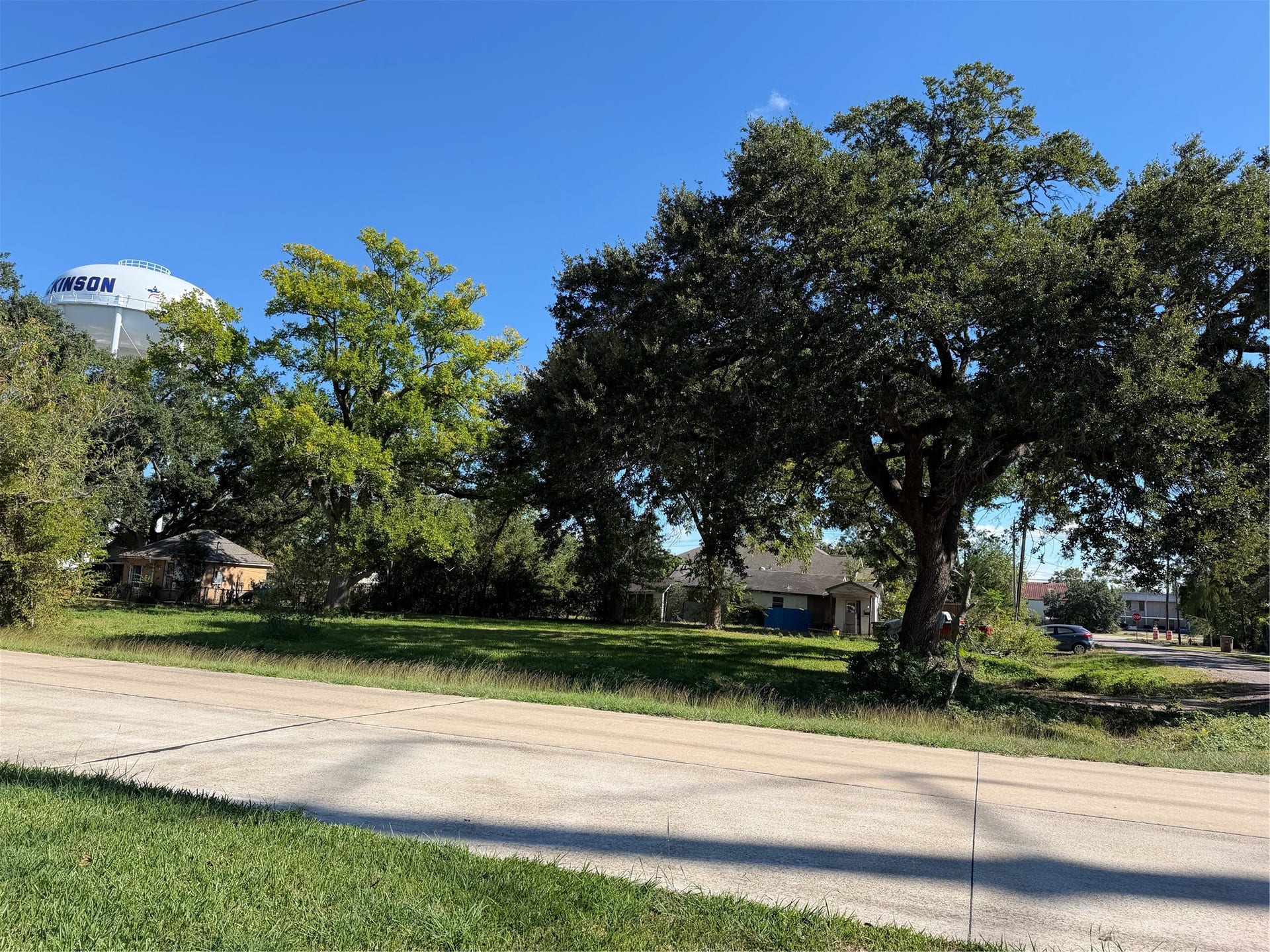 3705 Venze Street, Dickinson, TX 77539 Natural Beauty and Neighborhood Charm!
Towering mature trees enhance the property's appeal, creating a picturesque backdrop for a future residence.