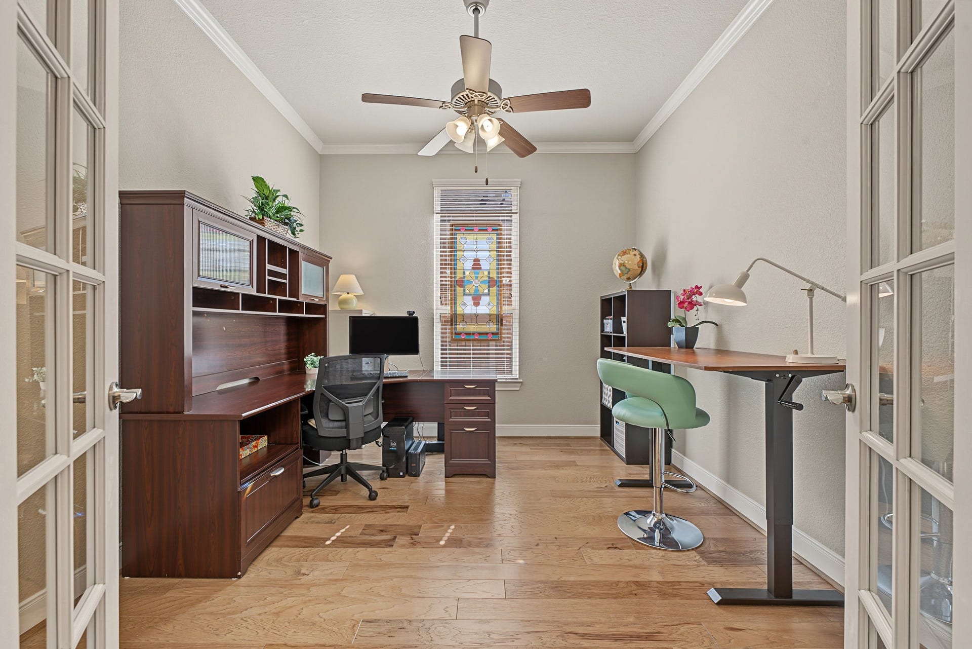 229 Percheron Drive, Spring, TX 77382 This home office/study is approx 12' x 11' with LVP flooring, crown molding, and double French doors for privacy.