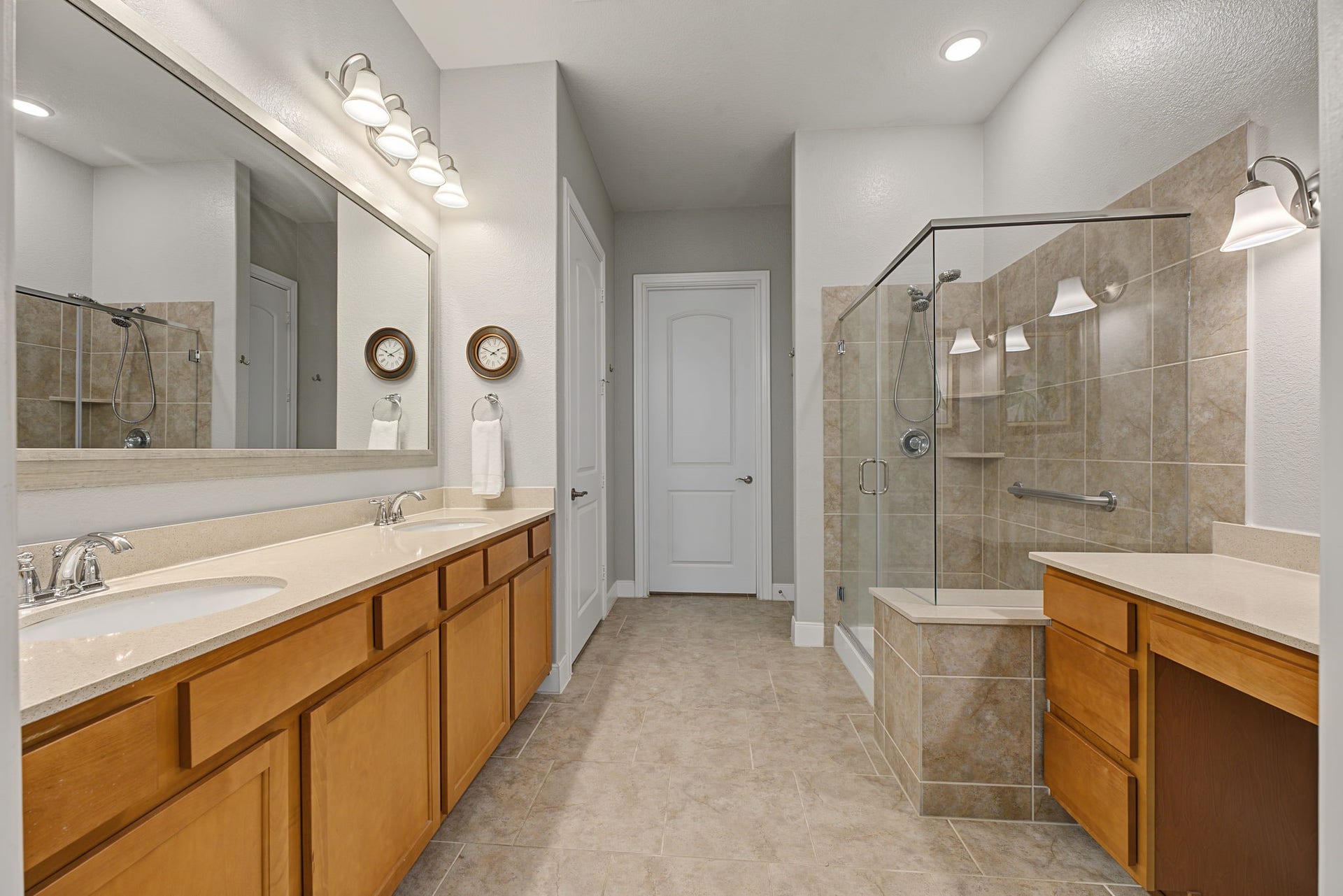 229 Percheron Drive, Spring, TX 77382 The Primary Bathroom has two sinks plus a separate vanity/storage area on the right.